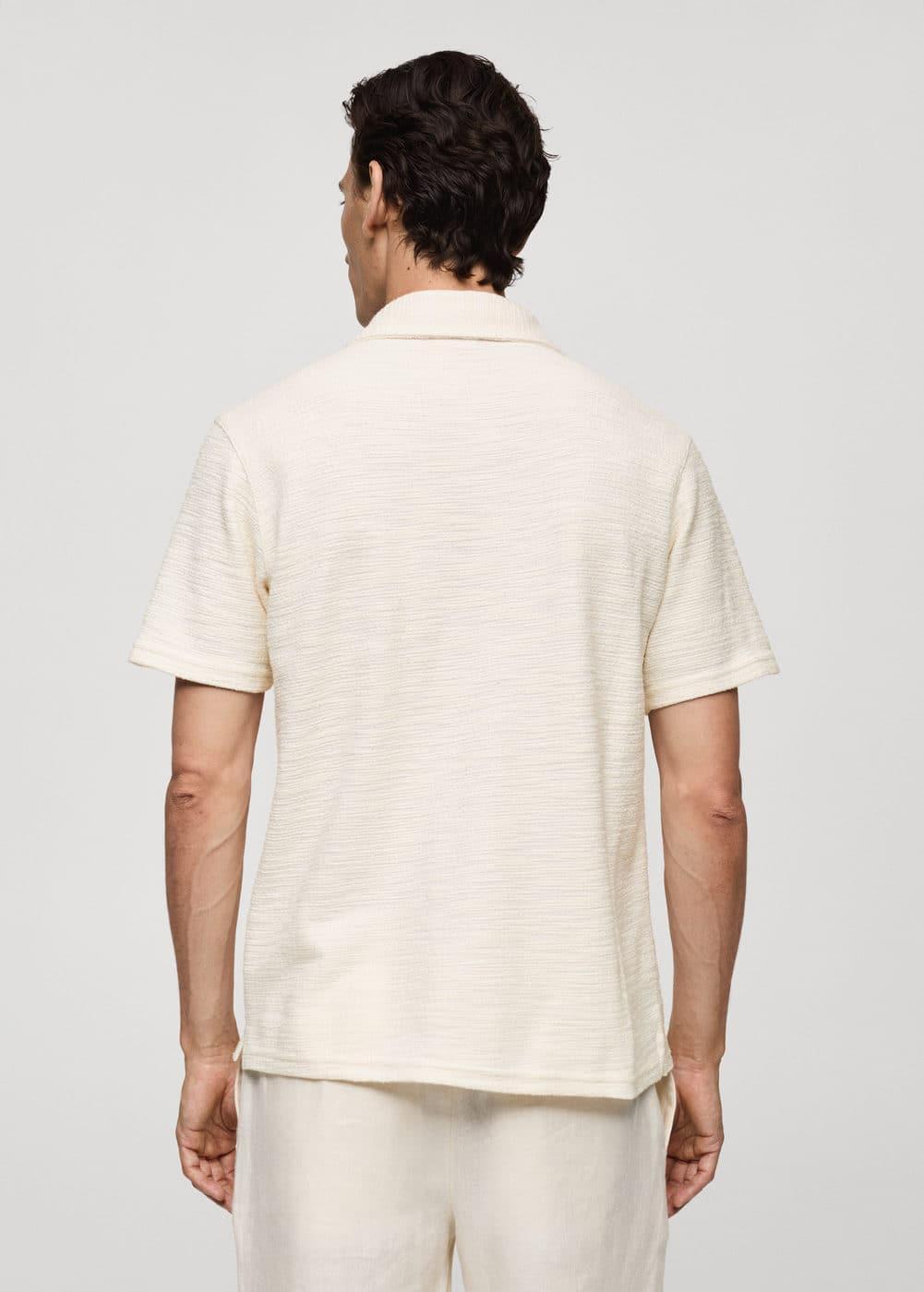 Regular-fit textured knitted polo shirt - Men | MANGO USA Product Image