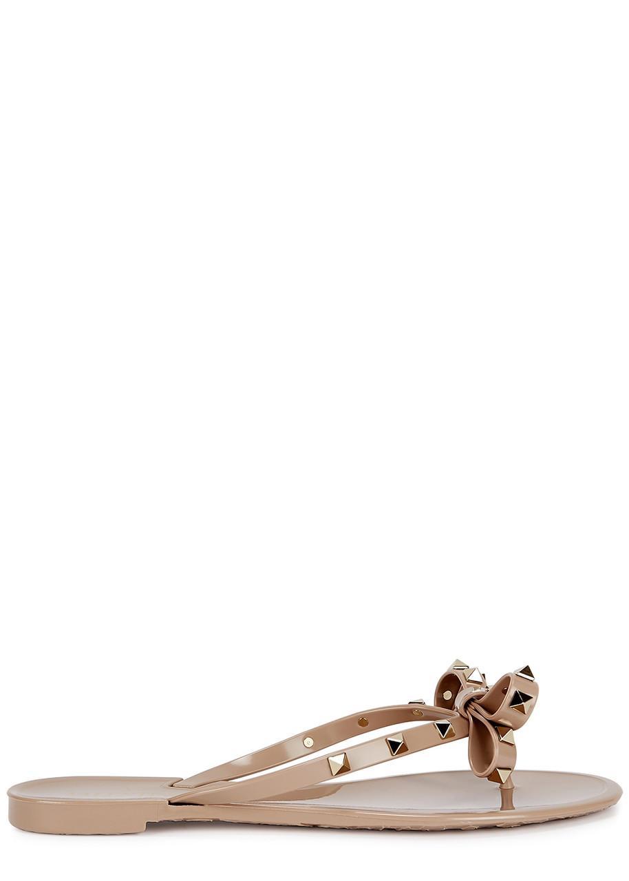 VALENTINO GARAVANI Women Rockstud Rubber Flip Flops In Beige Product Image