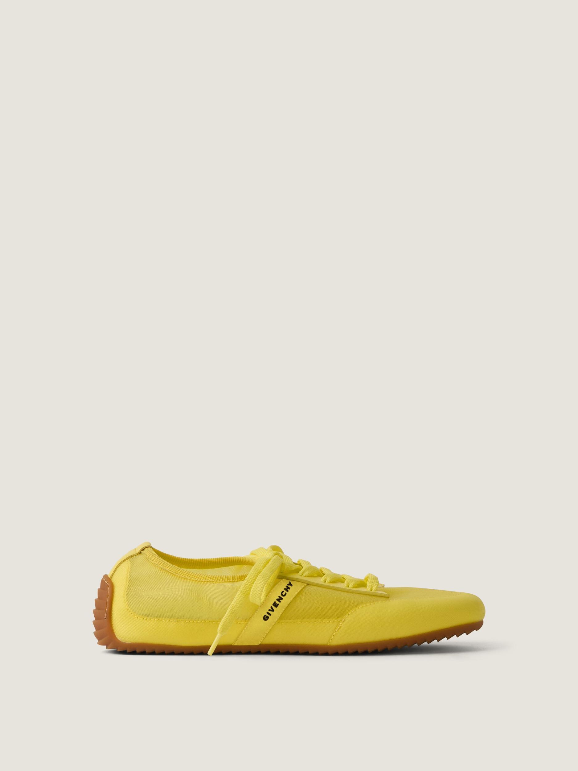 Slim sneakers in transparent mesh and leather Product Image
