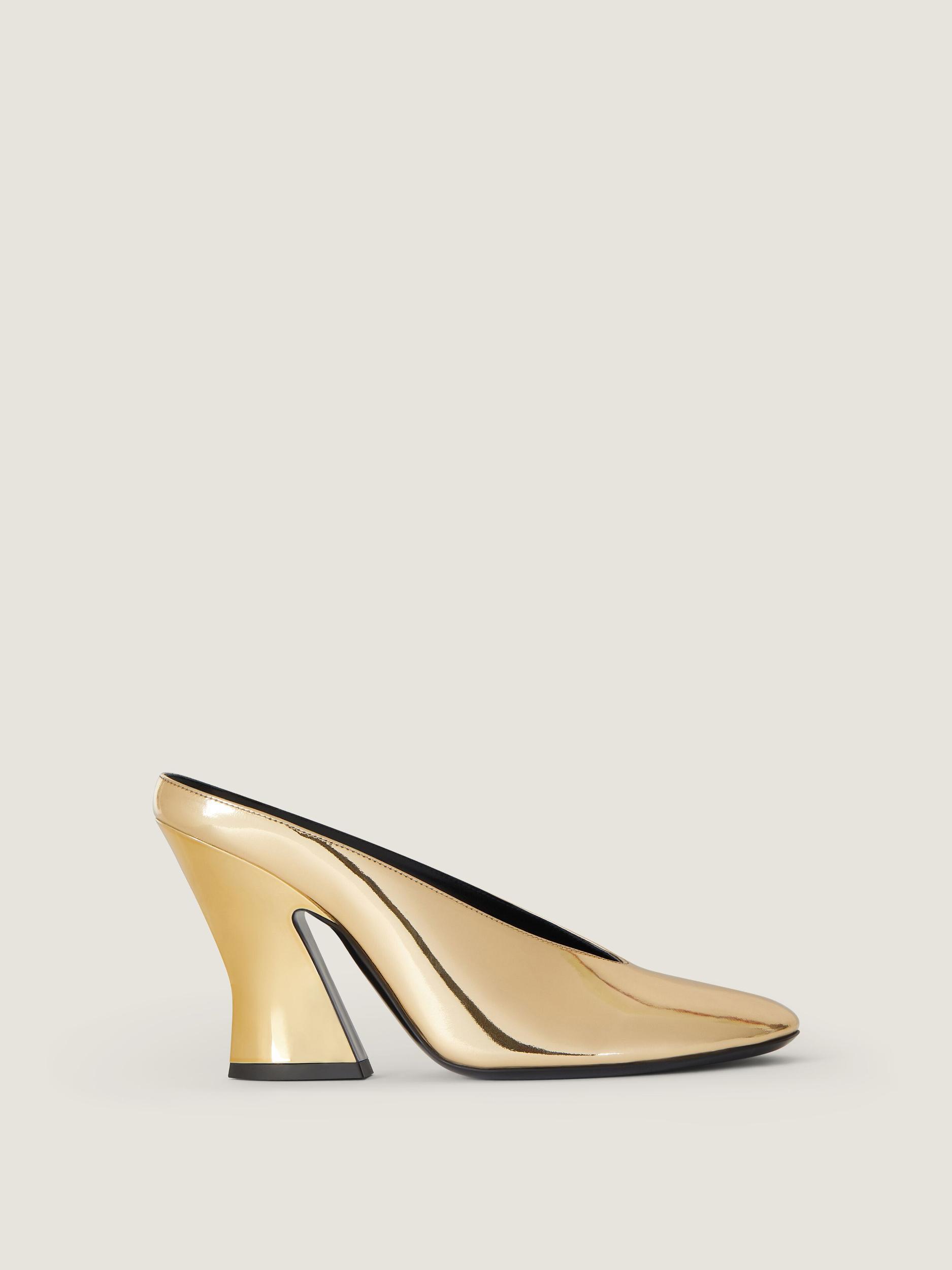 Sculpted heeled mules in mirror effect leather Product Image