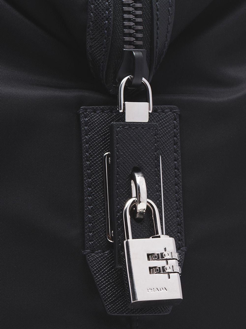 Re-Nylon triangle logo holdall bag Product Image