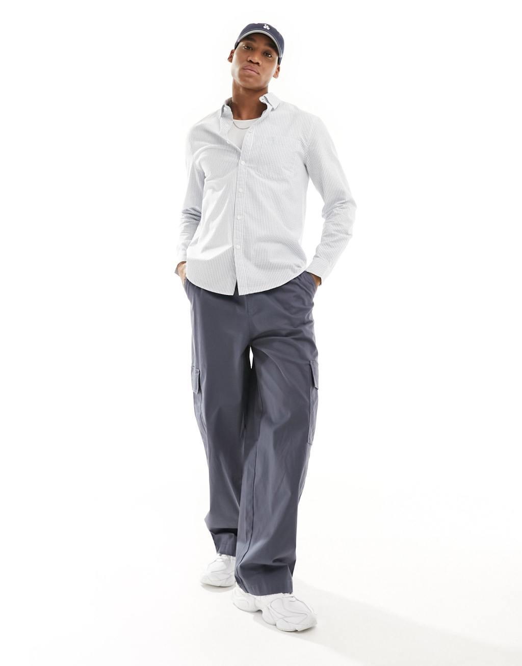 ASOS DESIGN seersucker textured smart shirt in light blue stripe Product Image