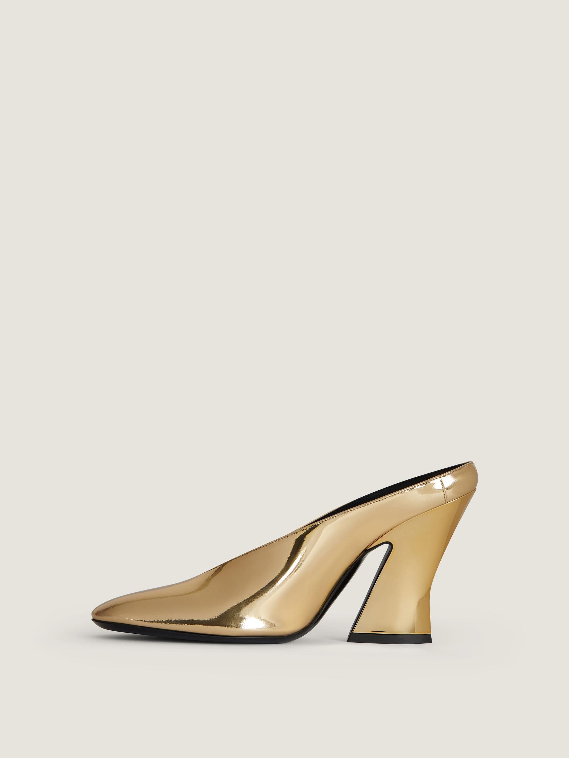 Sculpted heeled mules in mirror effect leather Product Image