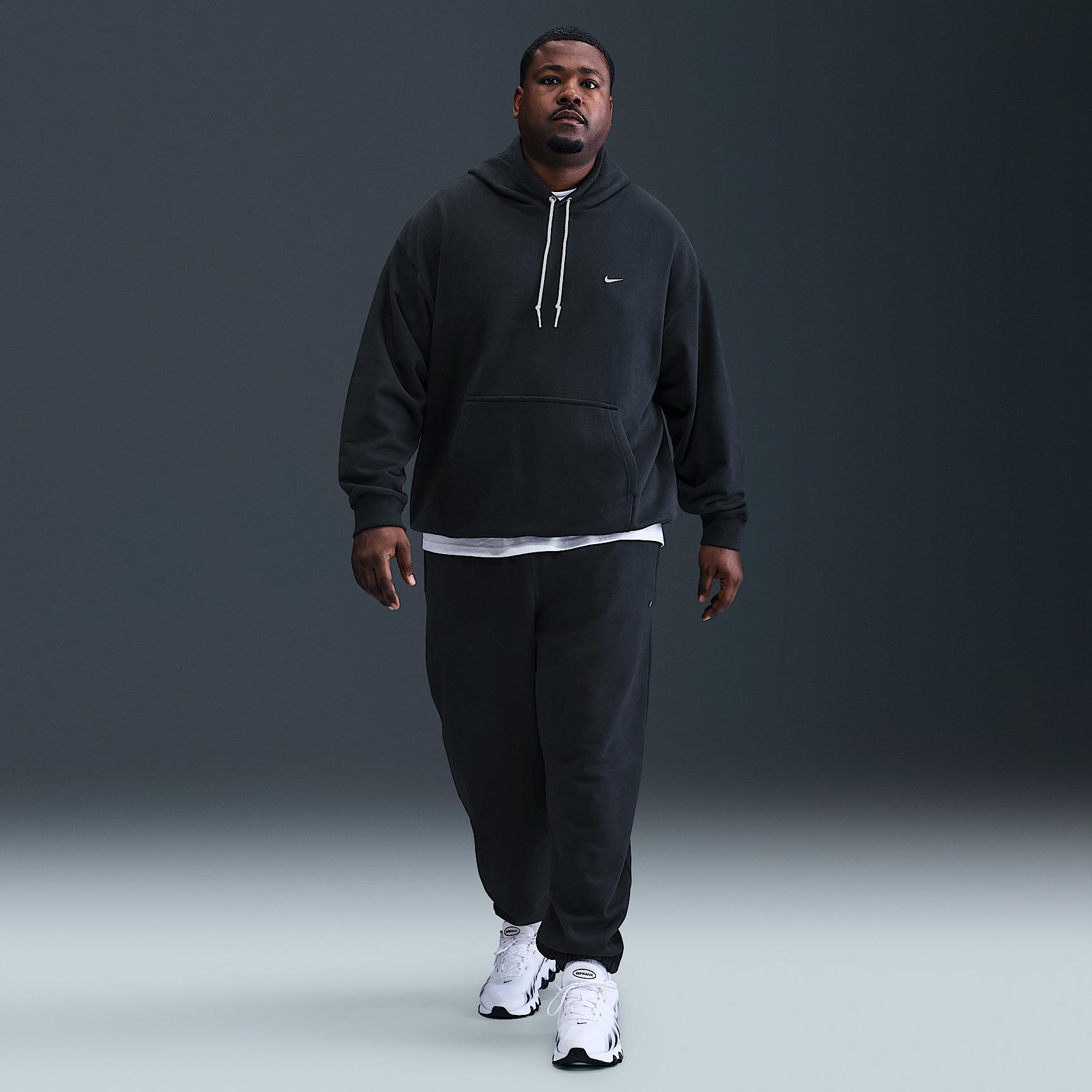 Nike Men's Solo Swoosh Cuffed Fleece Pants Product Image