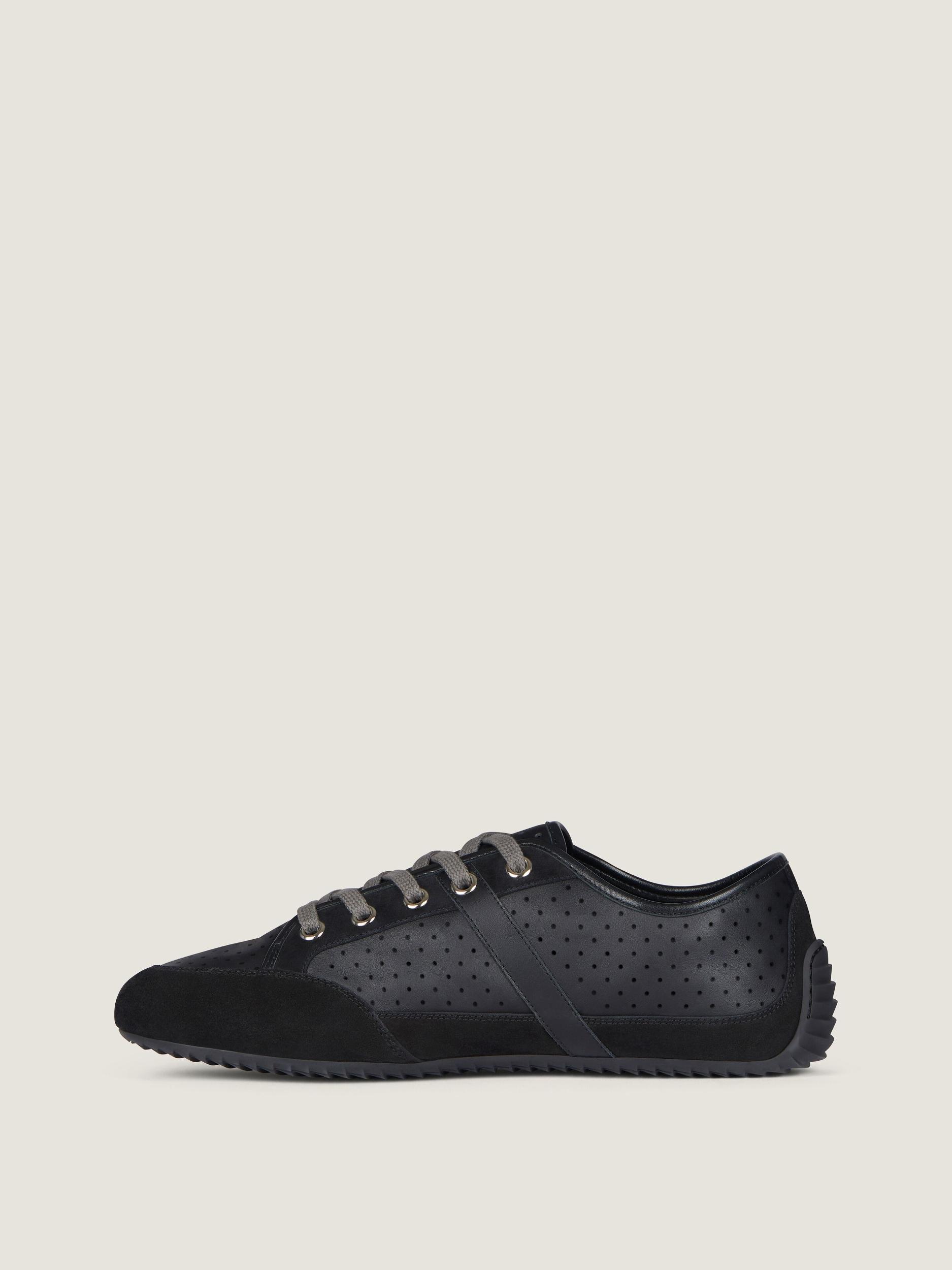 Slim sneakers in perforated leather and suede Product Image