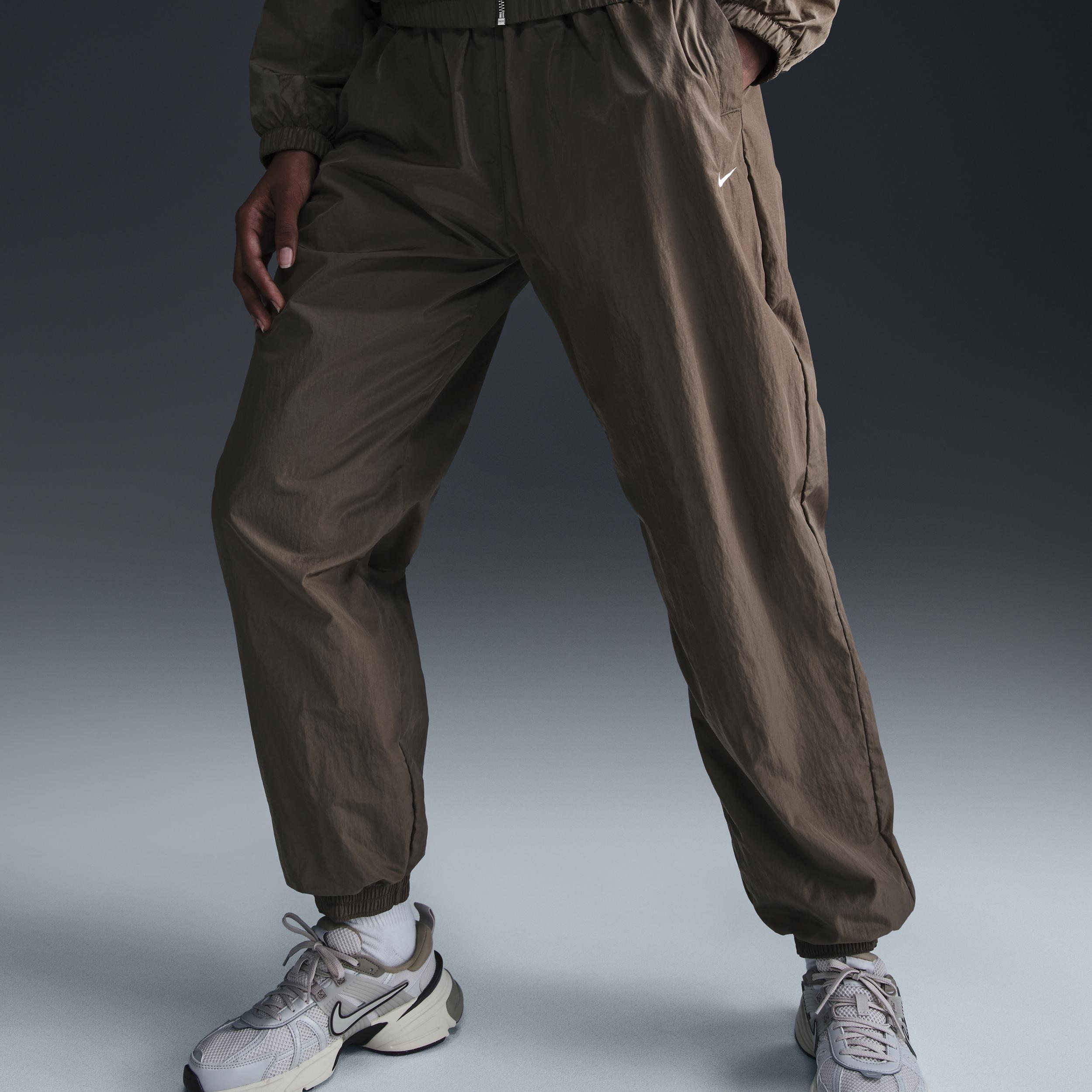Nike Sportswear Essential Women's Mid-Rise Oversized Woven Joggers Product Image