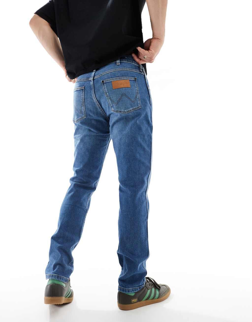 Wrangler Larston slim tapered fit jeans in light wash Product Image