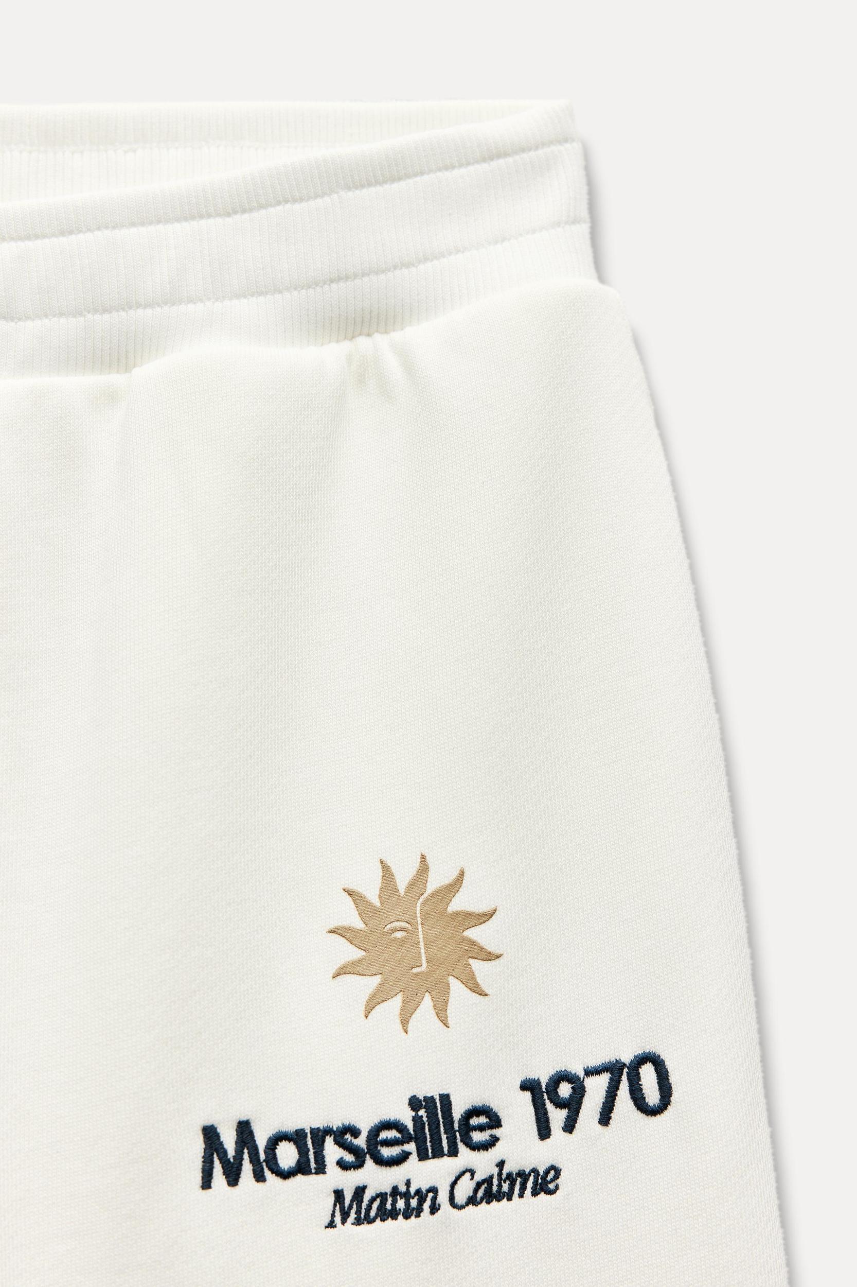 EMBROIDERED PLUSH PANTS Product Image