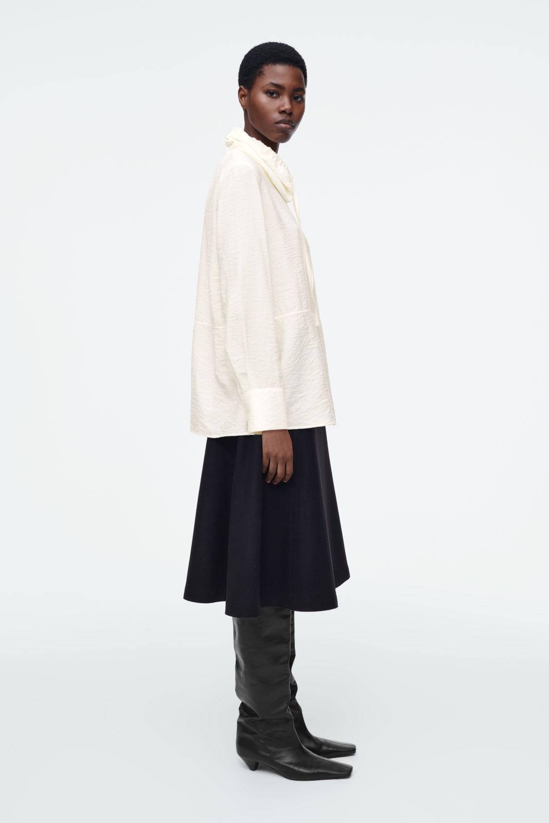 DRAWSTRING FUNNEL-NECK BLOUSE Product Image
