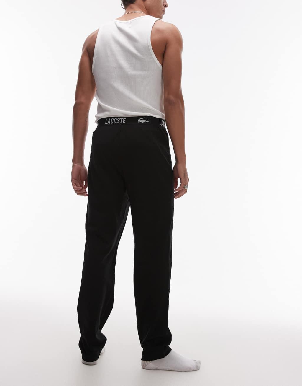 Lacoste loungewear pants in black with waistband taping Product Image