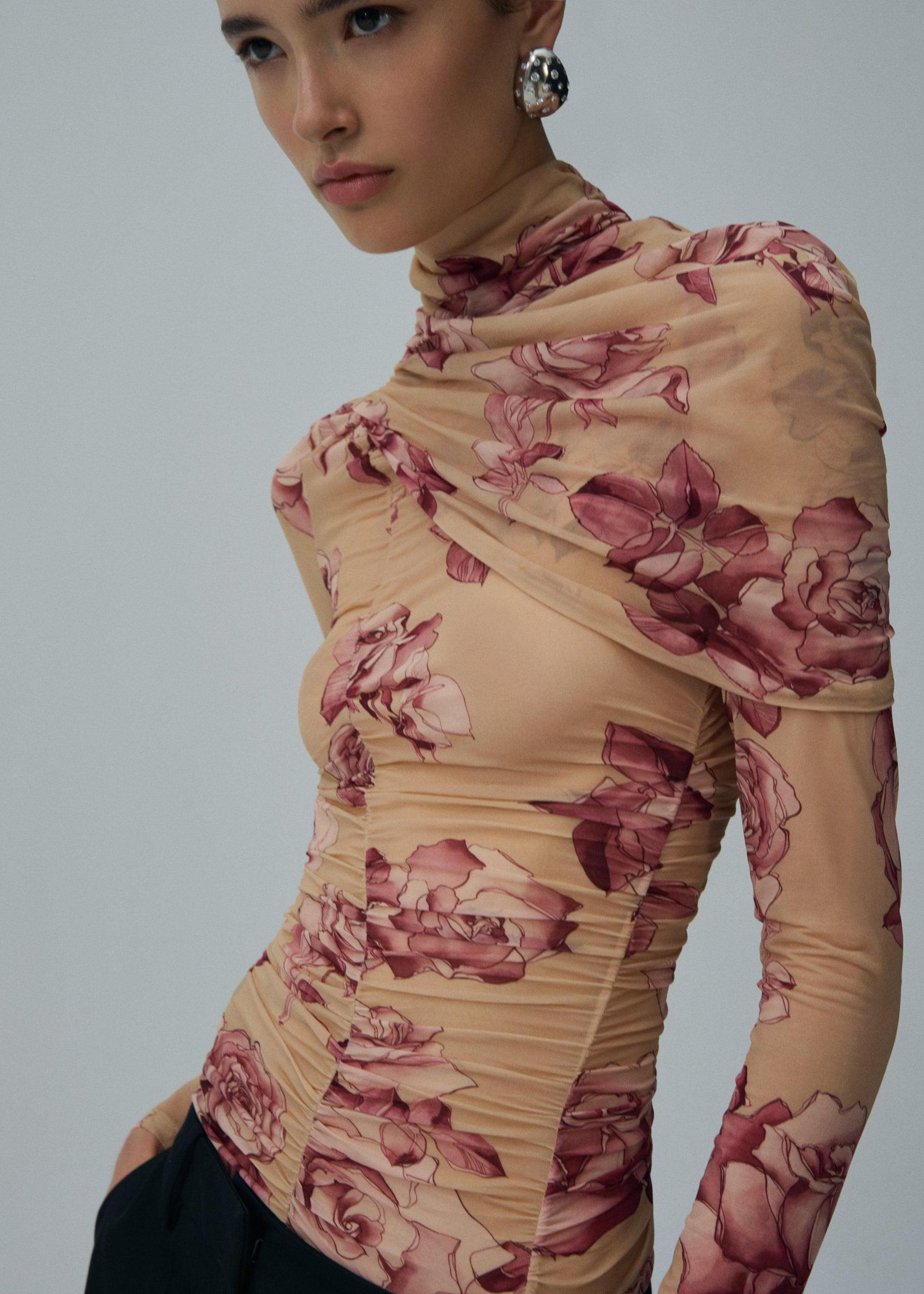 Draped high neck blouse in beige print Product Image