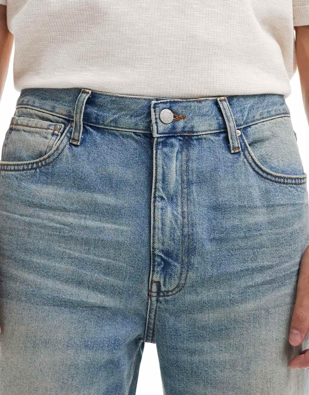 ASOS DESIGN straight leg jeans in mid blue wash Product Image
