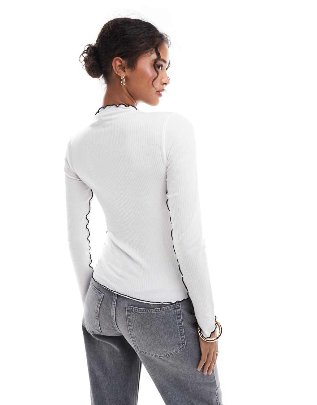 Pieces long sleeved top with contrast lettuce edge detailing in white Product Image