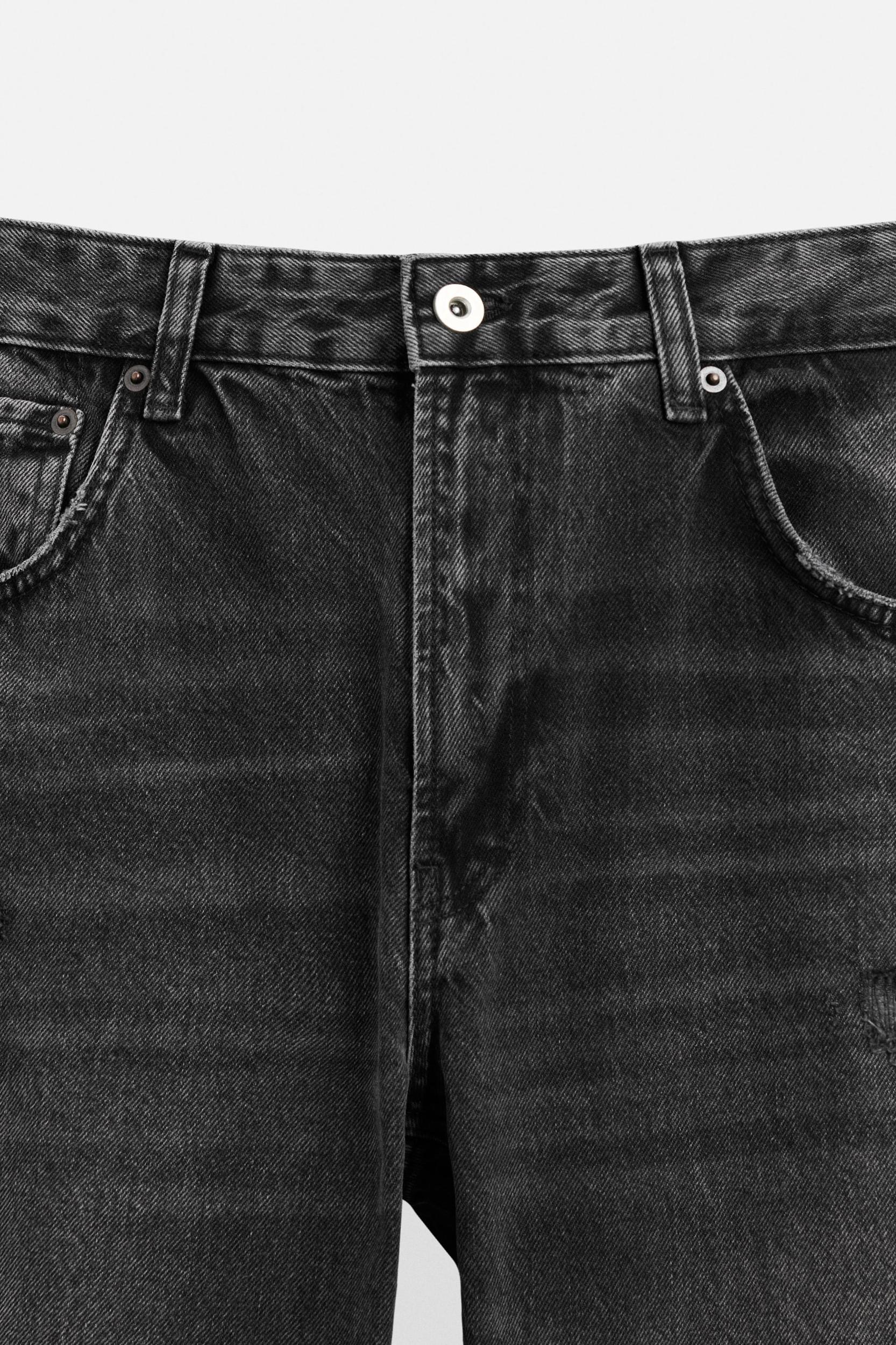 RIPPED FLARE FIT JEANS Product Image