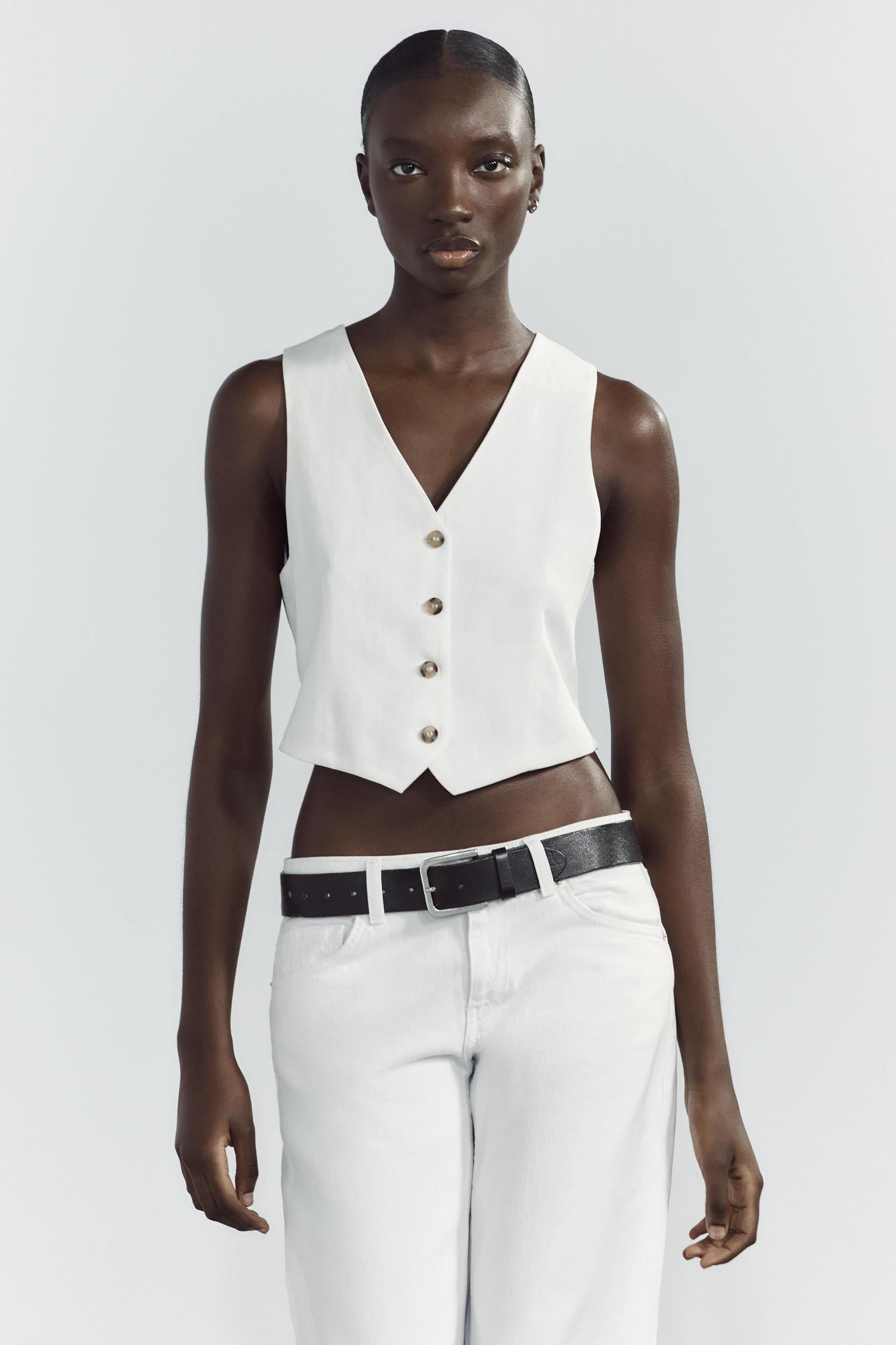 BACK CUT OUT VEST Product Image