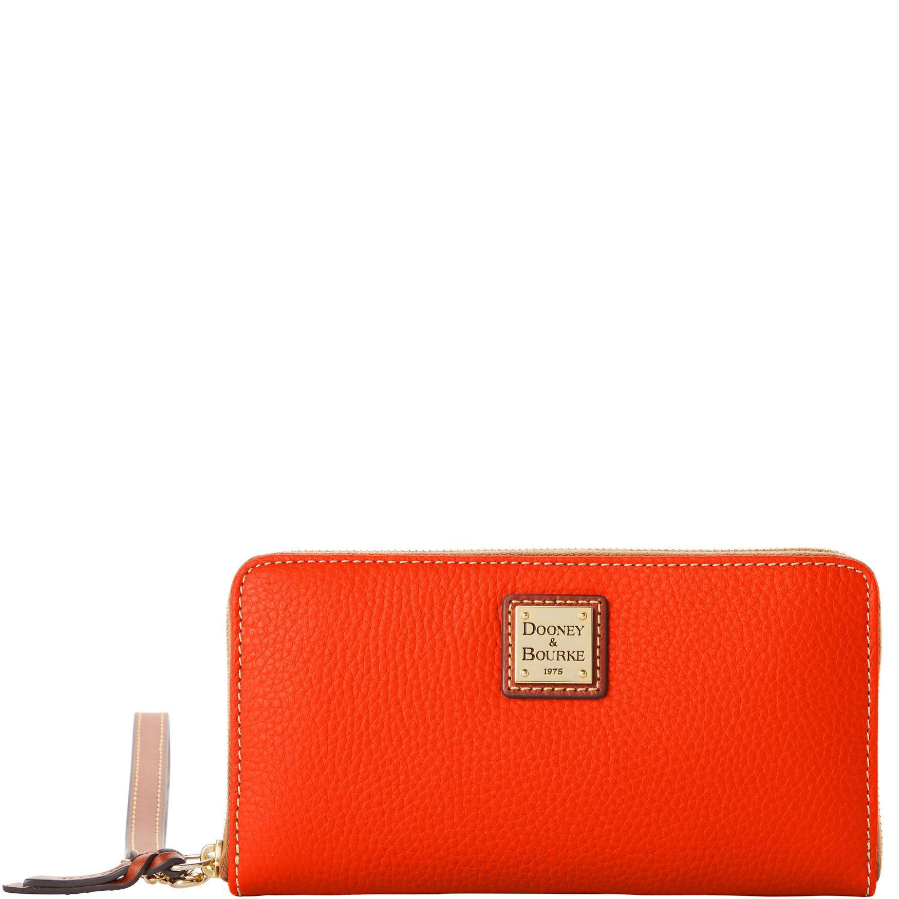 Dooney & Bourke Womens Pebble Grain Large Zip Around Leather Wristlet in Geranium Product Image