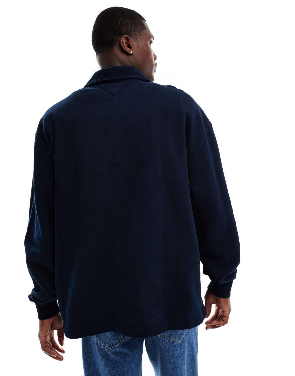 Tommy Jeans small logo 1/4 zip sweatshirt in washed navy Product Image