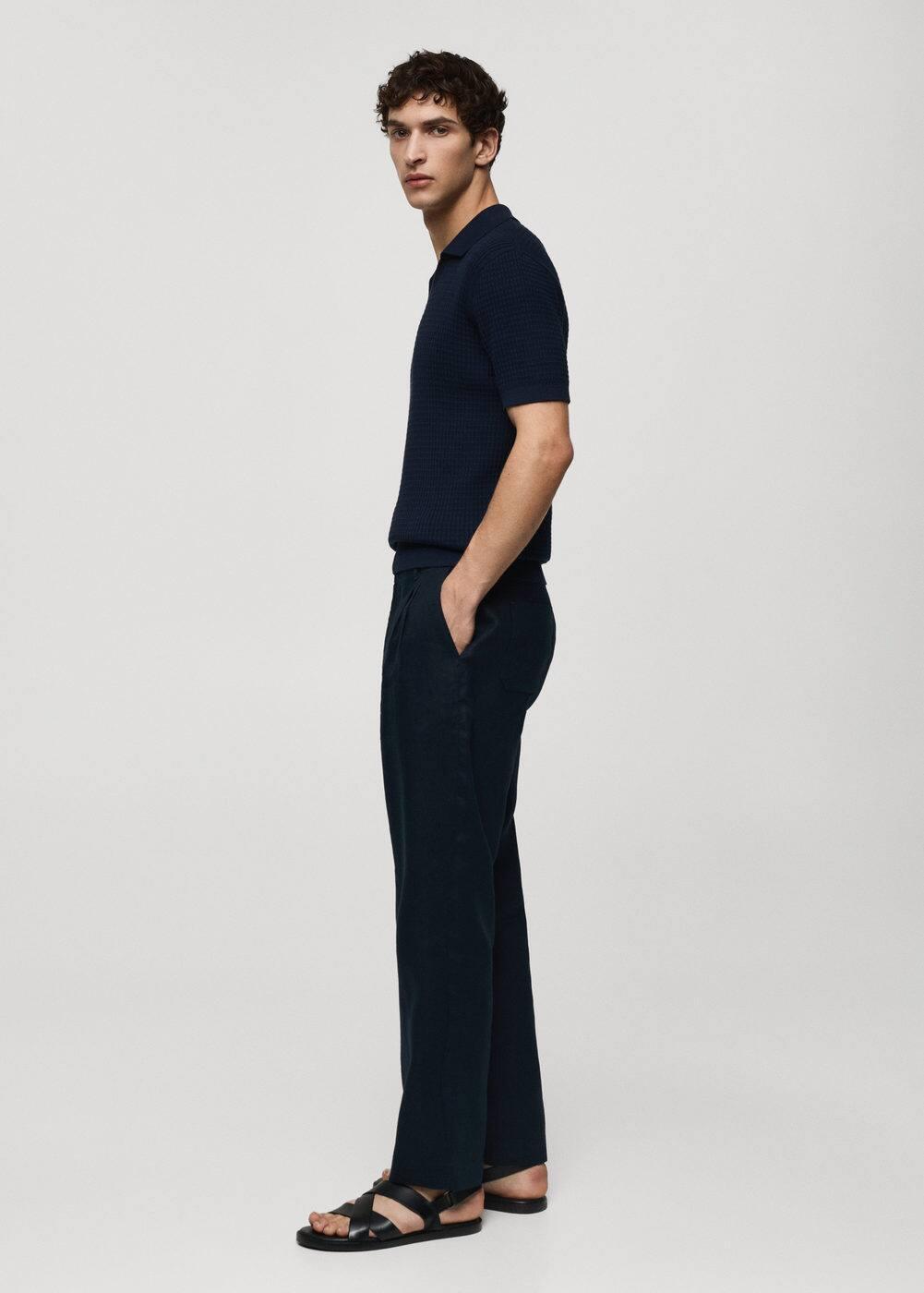Ribbed knit polo shirt - Men | MANGO USA Product Image