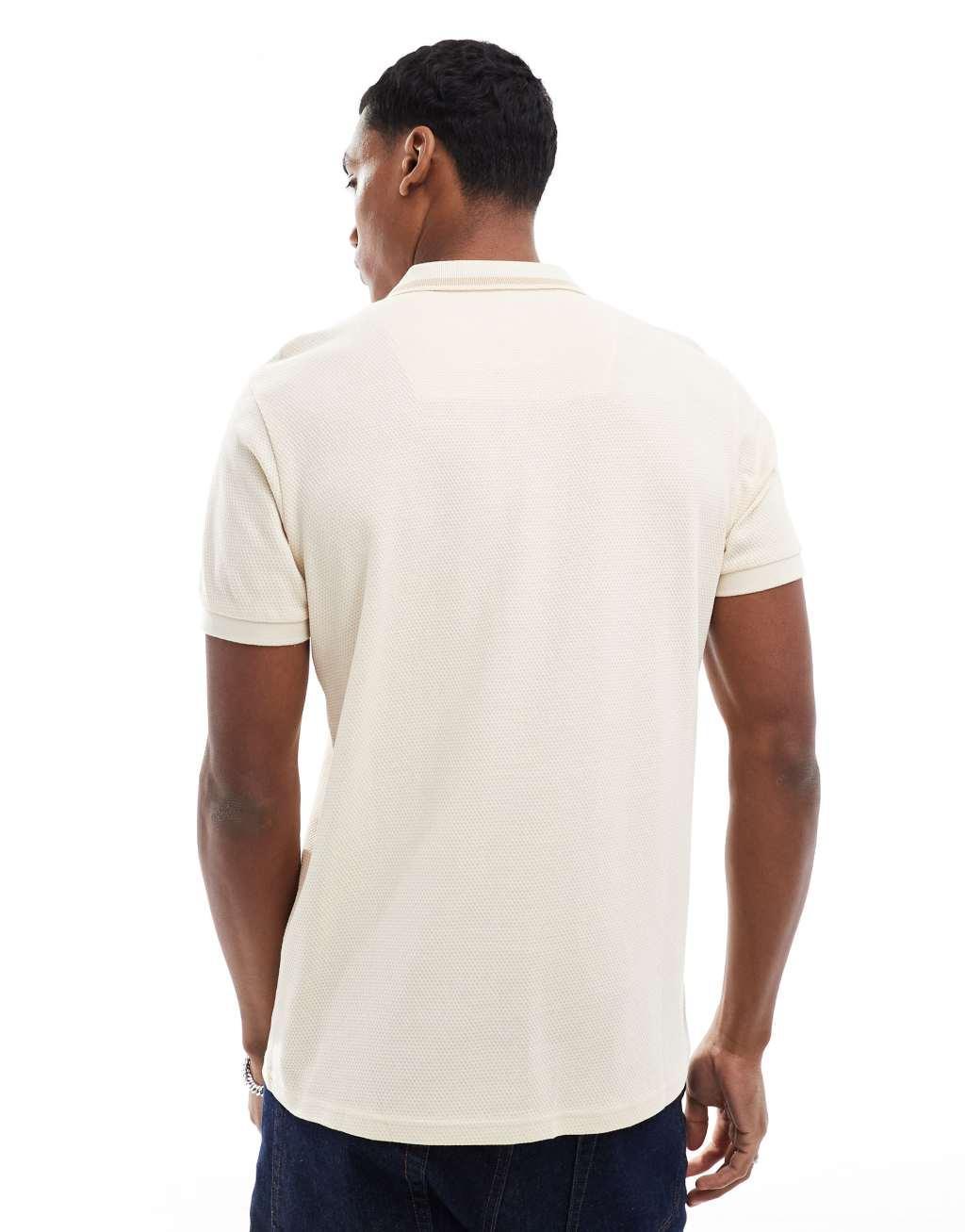 Threadbare pique striped polo shirt in beige Product Image