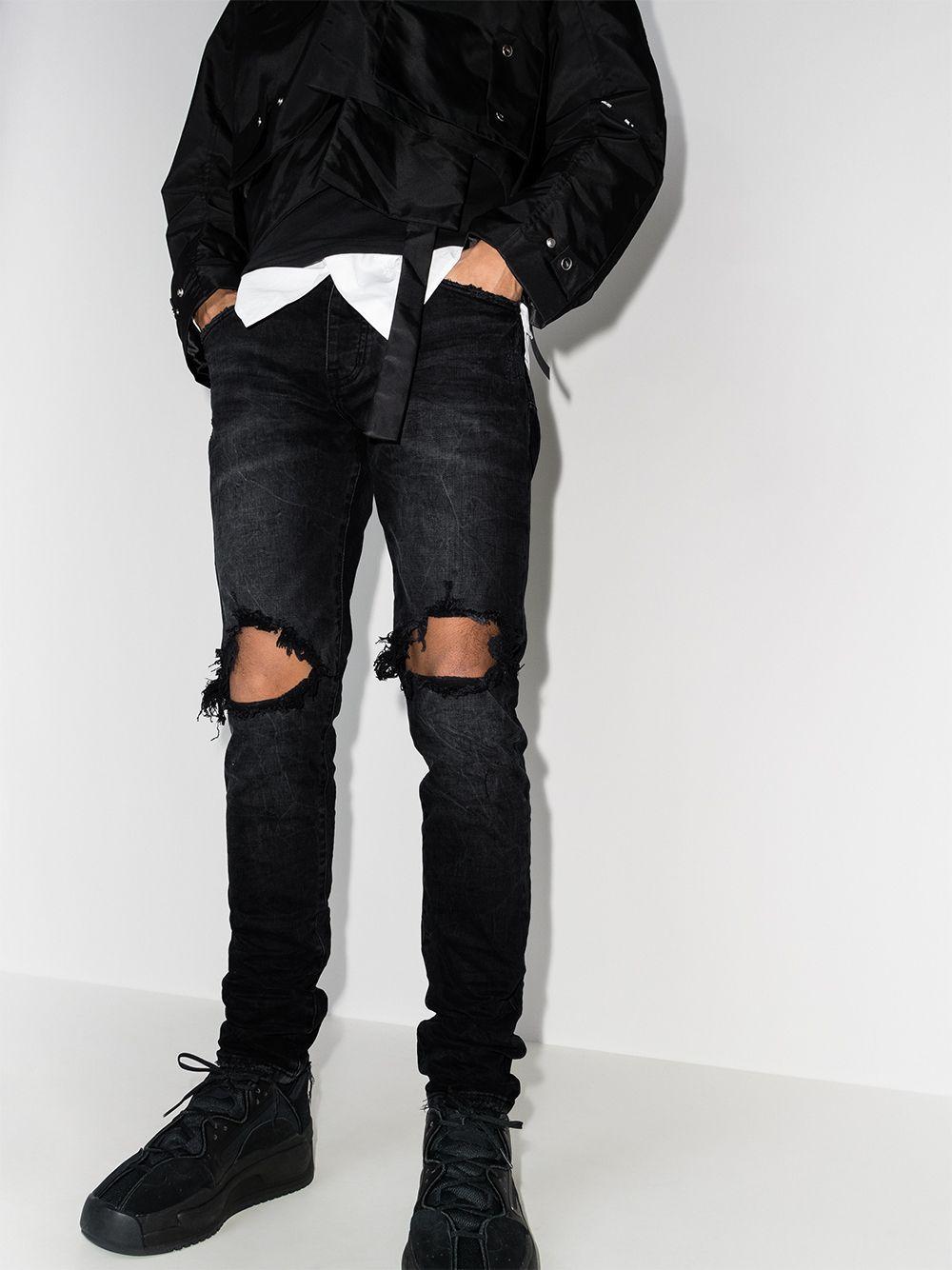 low-rise "Black Wash Blowout" slim jeans Product Image