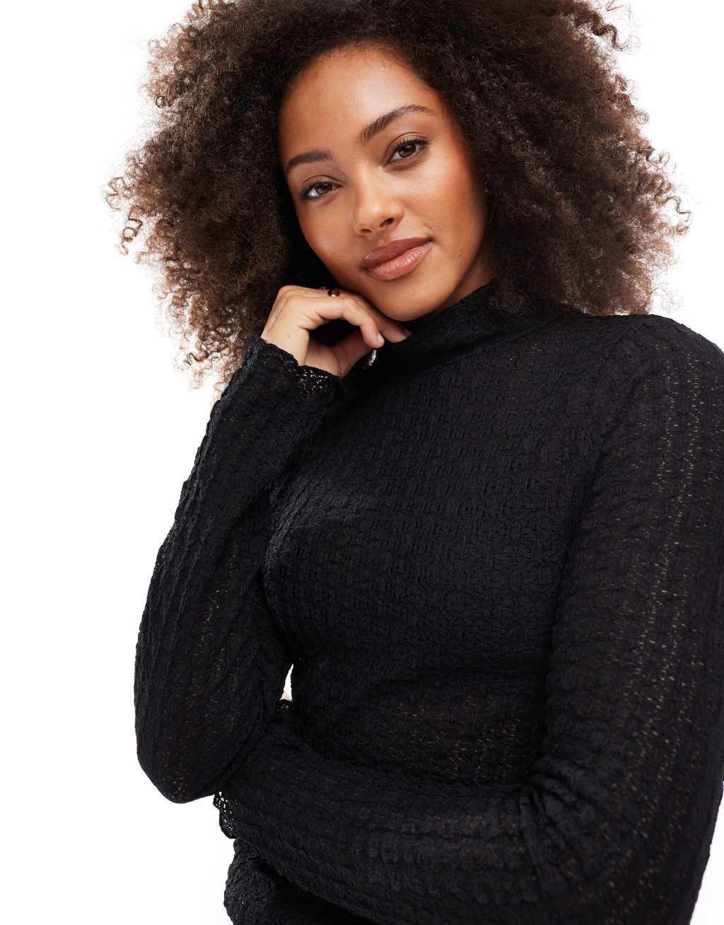 Vero Moda Aware textured long sleeved high neck top in black Product Image