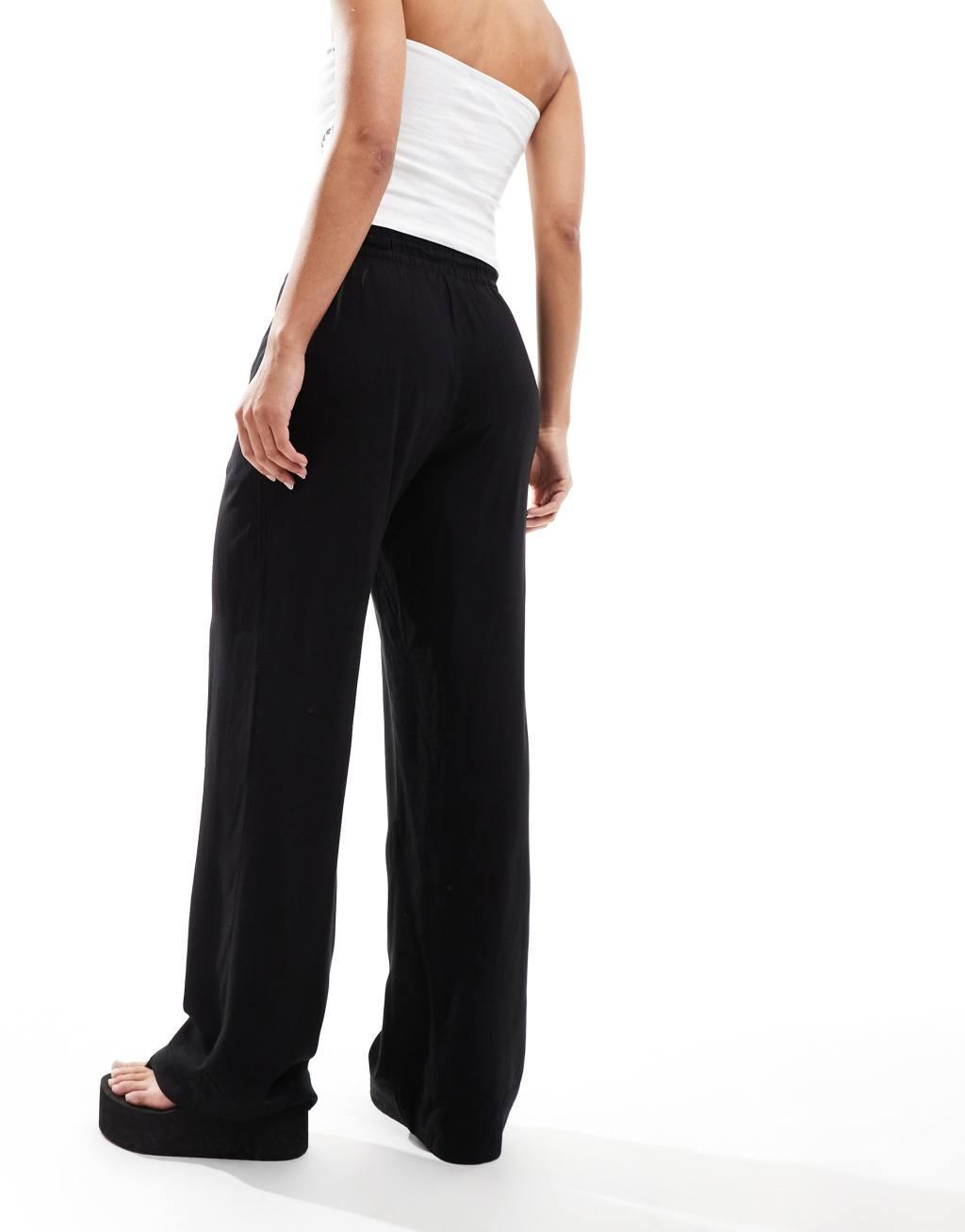 Monki drawstring waist pants in black Product Image