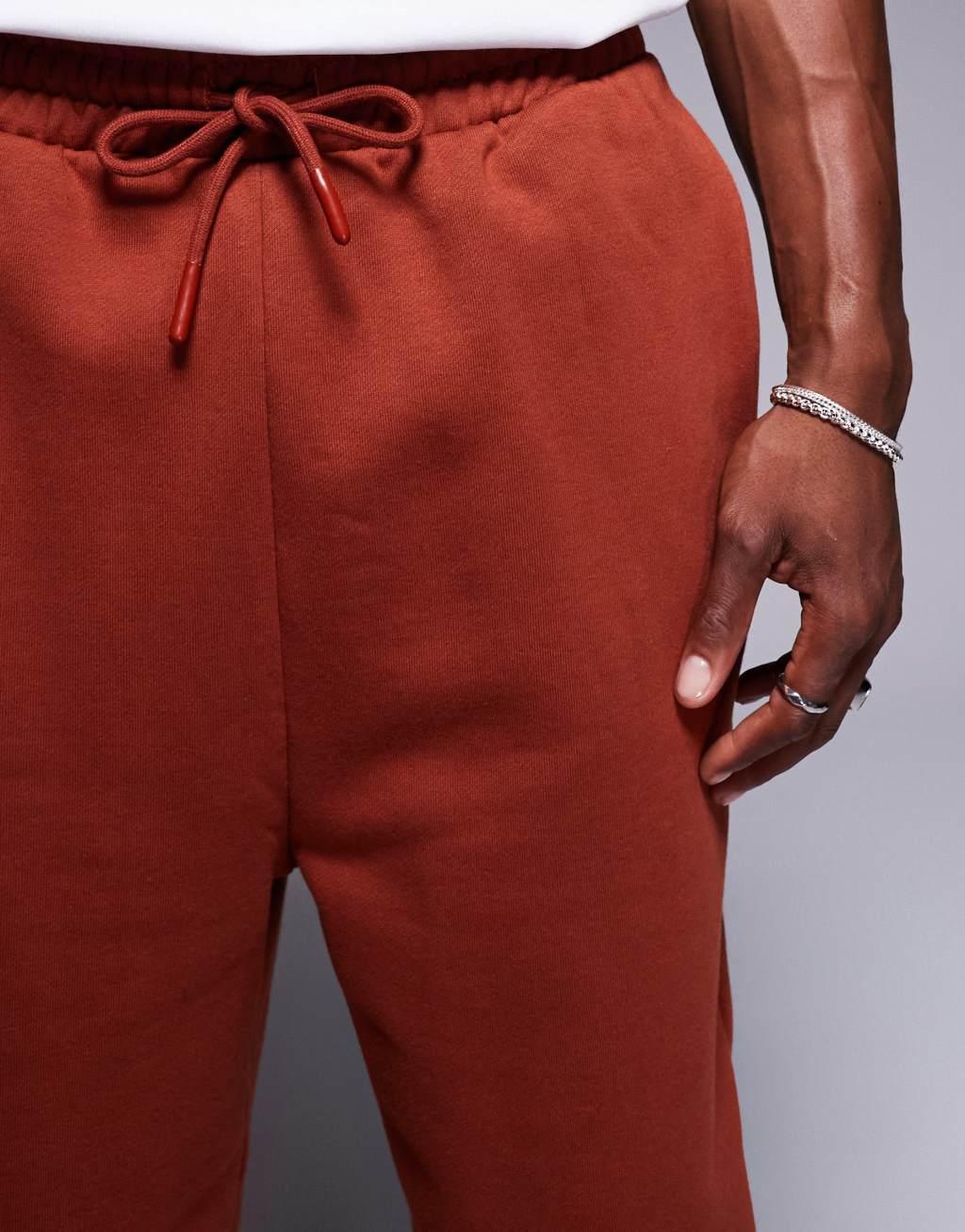 ASOS DESIGN premium heavyweight oversized sweatpants in burnt red Product Image