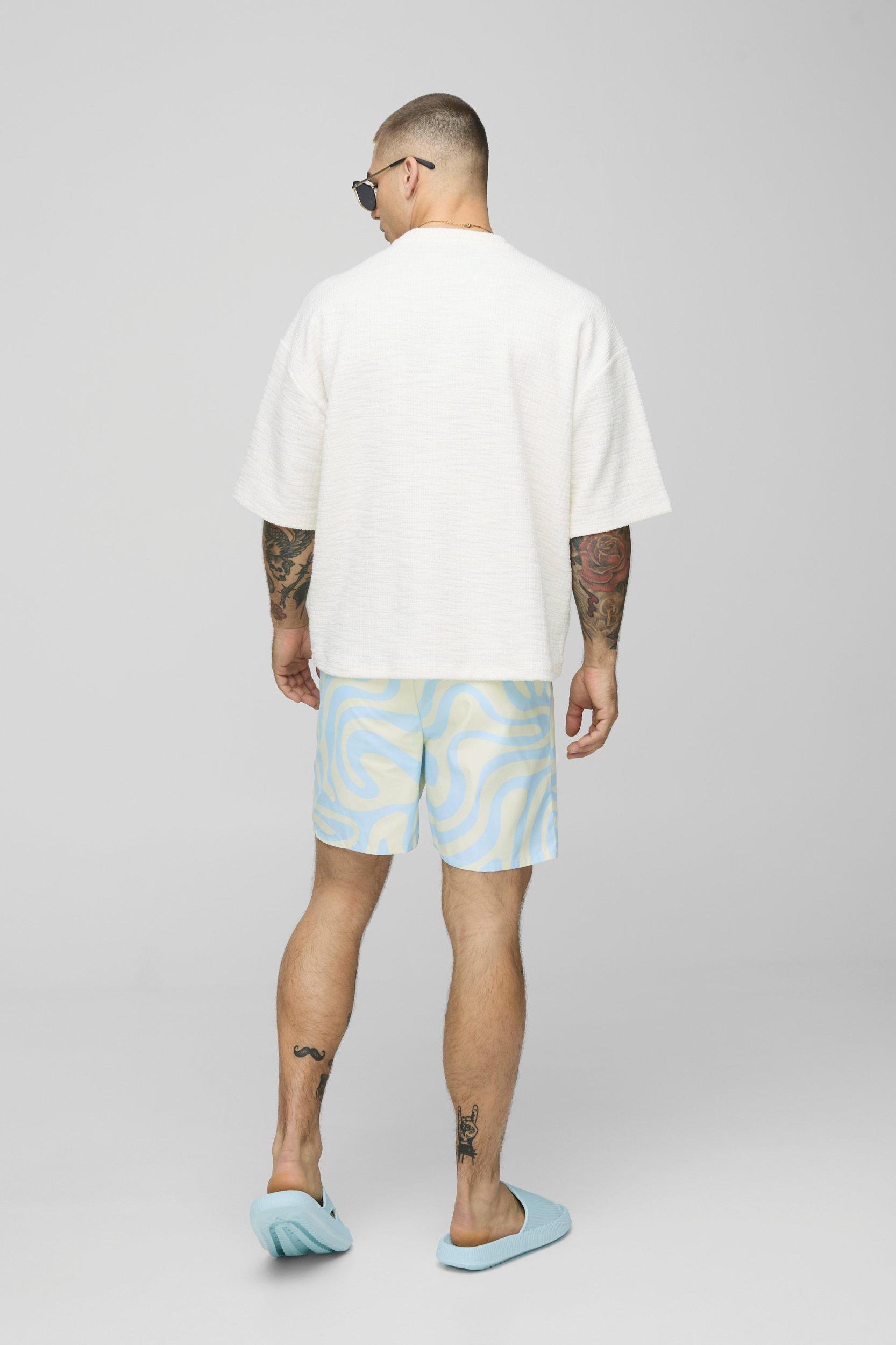 Mid Length Abstract Print Swim Trunks | boohooMAN USA Product Image