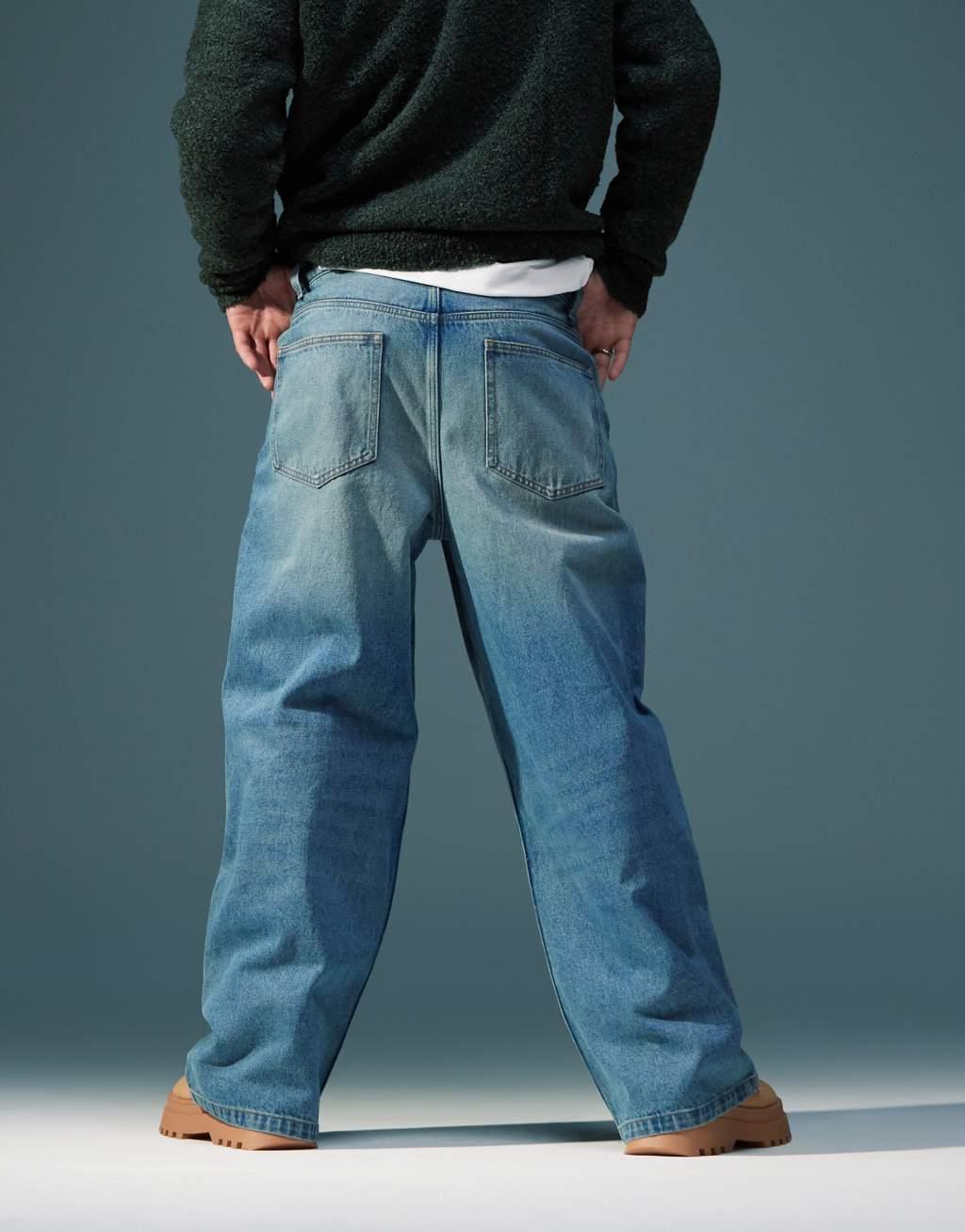 ASOS DESIGN super baggy carpenter jeans with tint in mid wash blue Product Image