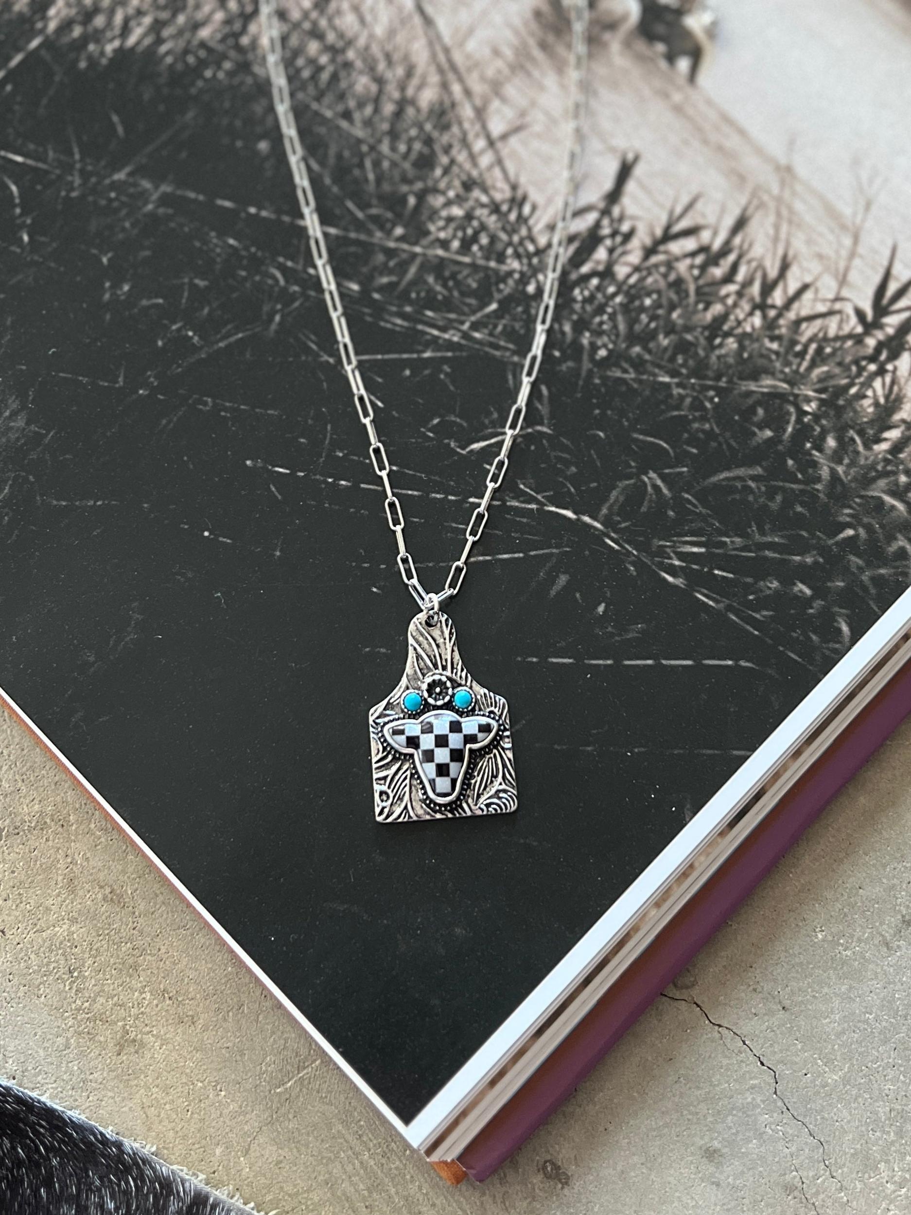 Checkered Cow Tooled Tag Necklace Product Image