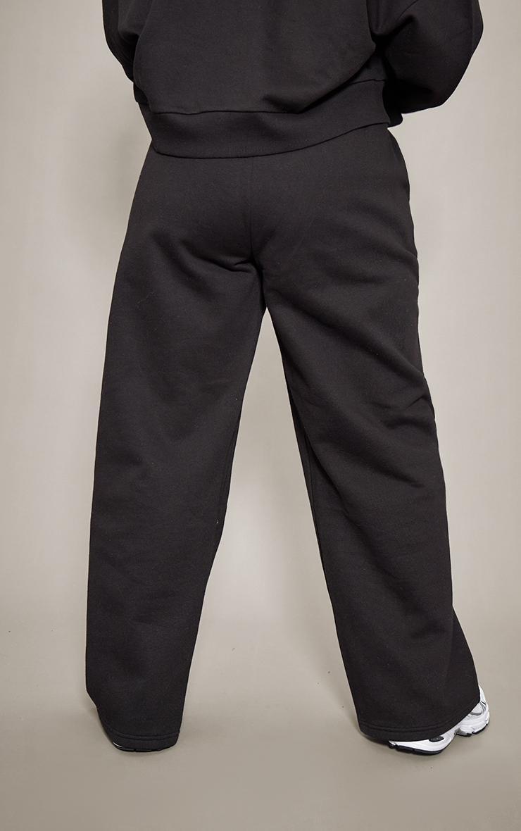 PRETTYLITTLETHING Plus Black Printed Premium Wide Leg Sweatpants Product Image