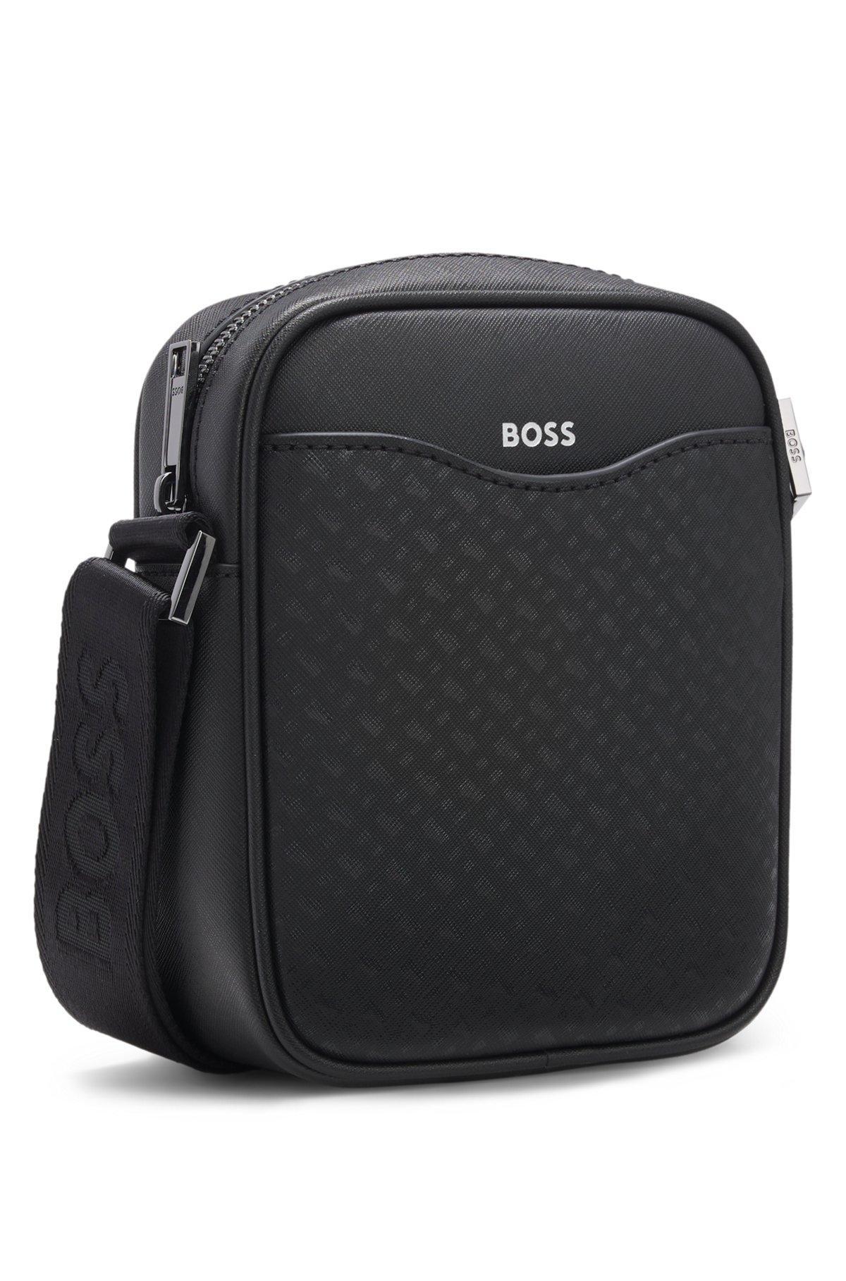 Reporter bag with monogram-patterned front pocket Product Image