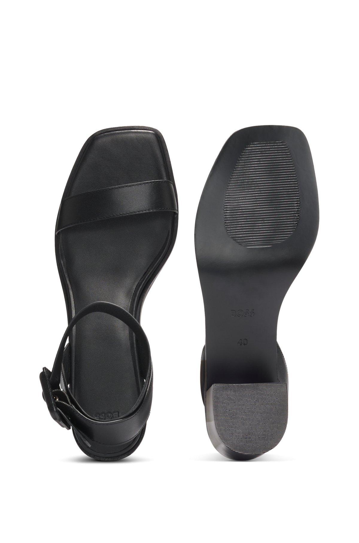 Leather sandals with block heel Product Image