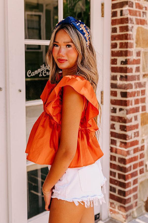 Stay Here Awhile Peplum Top In Rust Product Image
