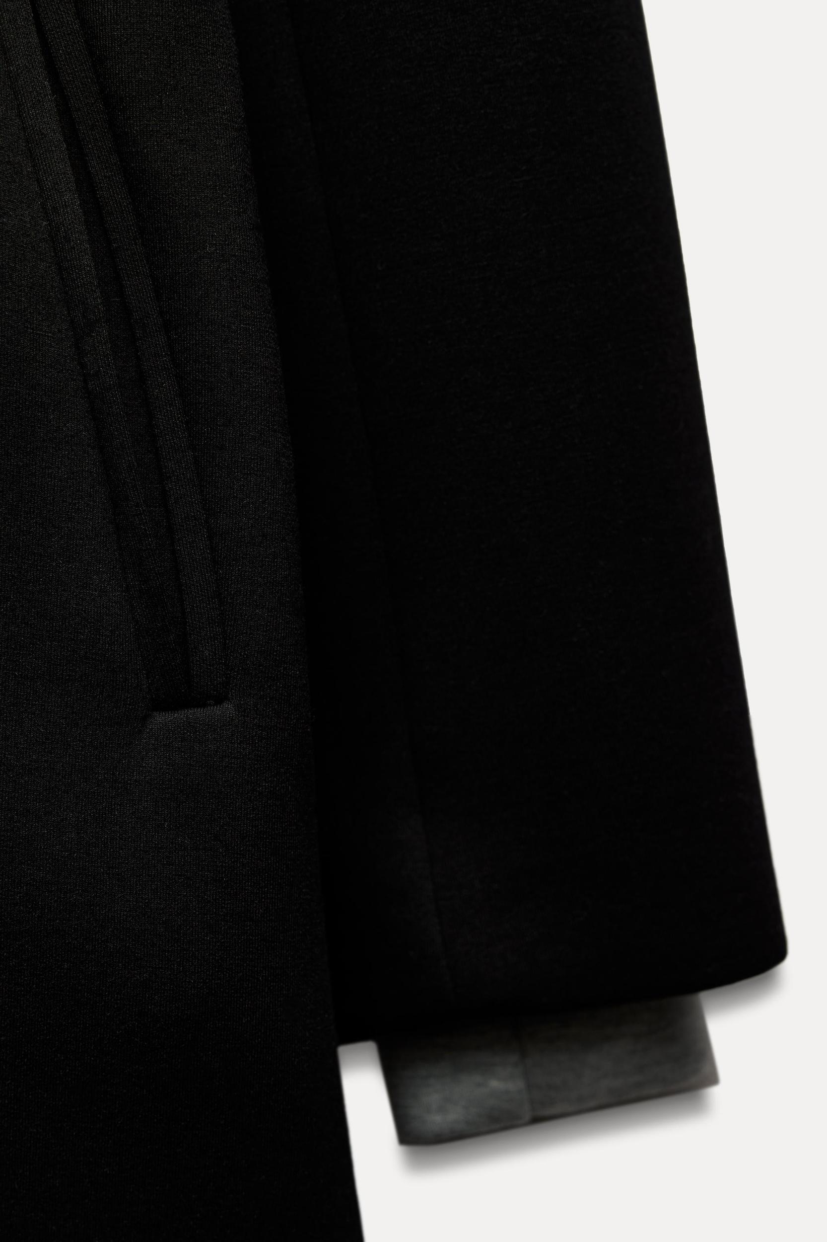 HOODED COMBINATION COAT Product Image