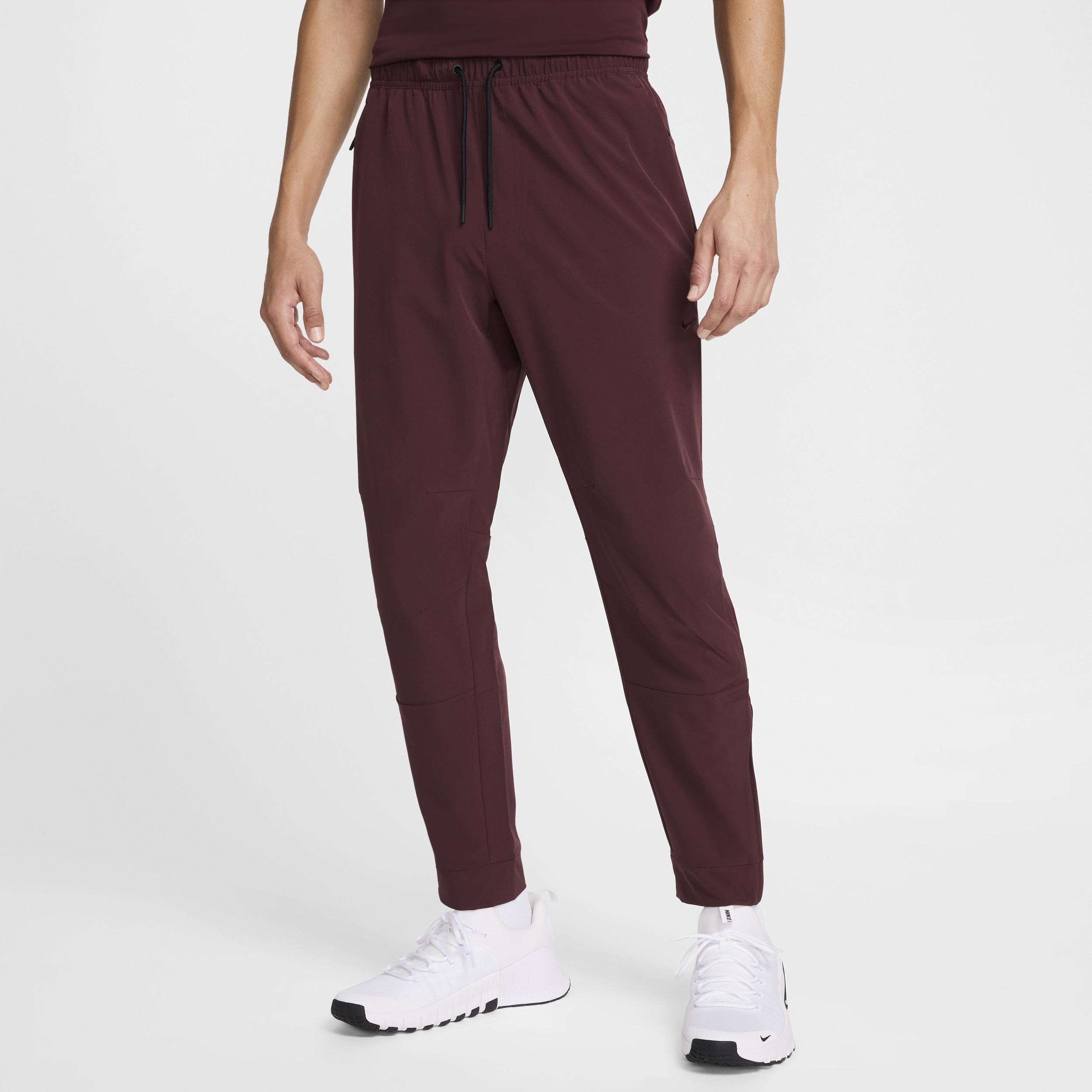 Nike Men's Unlimited Dri-FIT Zippered Cuff Versatile Pants Product Image