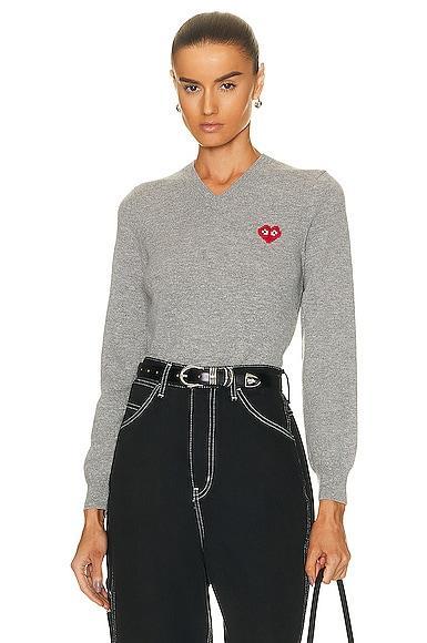 COMME des GARCONS PLAY Invader V-Neck Pullover Sweater in Black Product Image