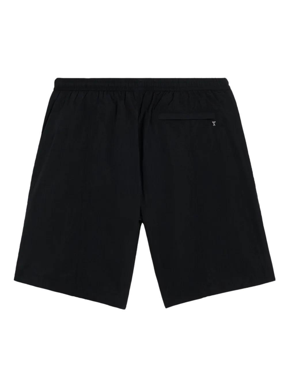 Ami de Coeur-plaque swim shorts Product Image