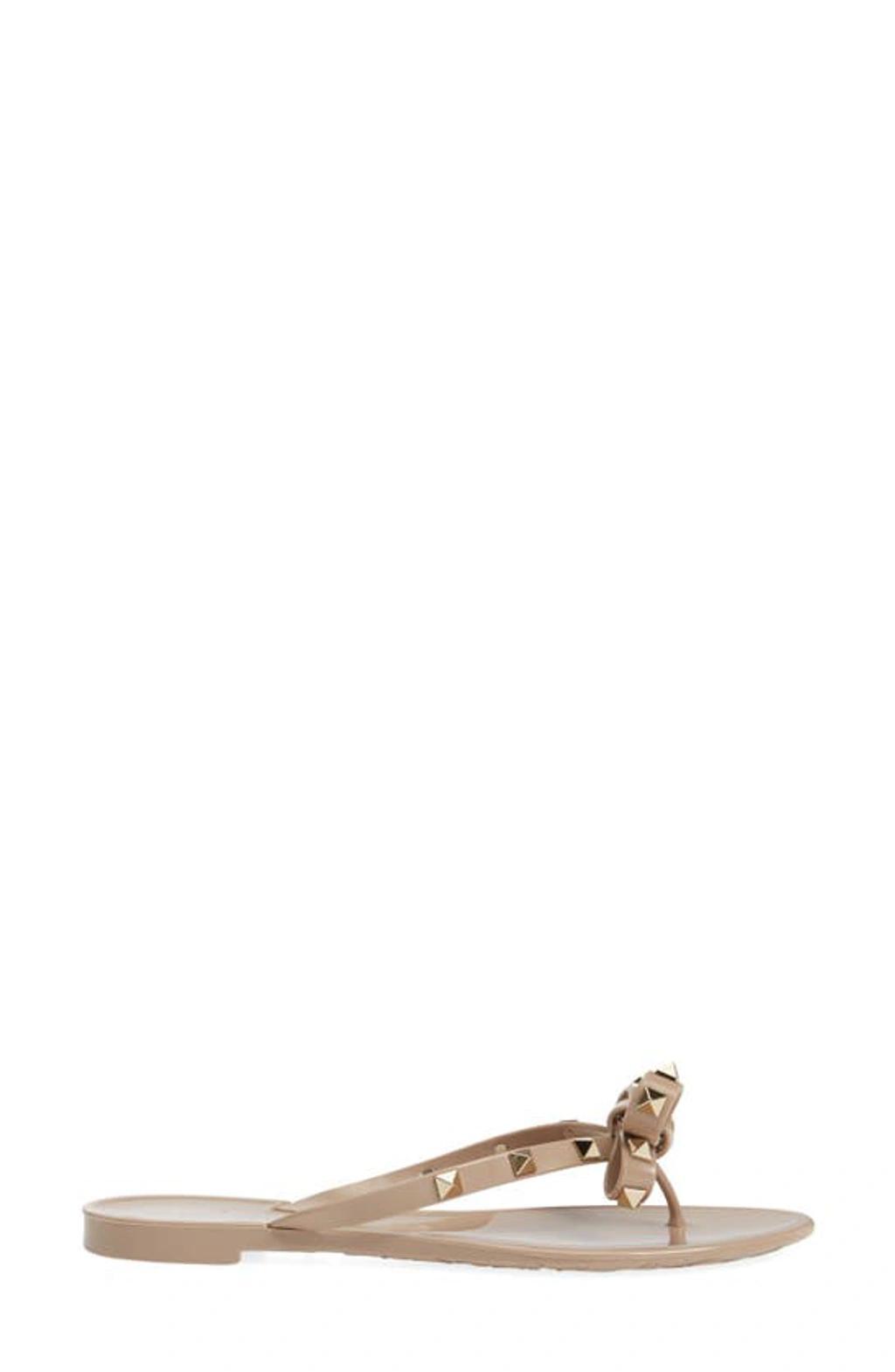VALENTINO GARAVANI Women Rockstud Rubber Flip Flops In Beige Product Image