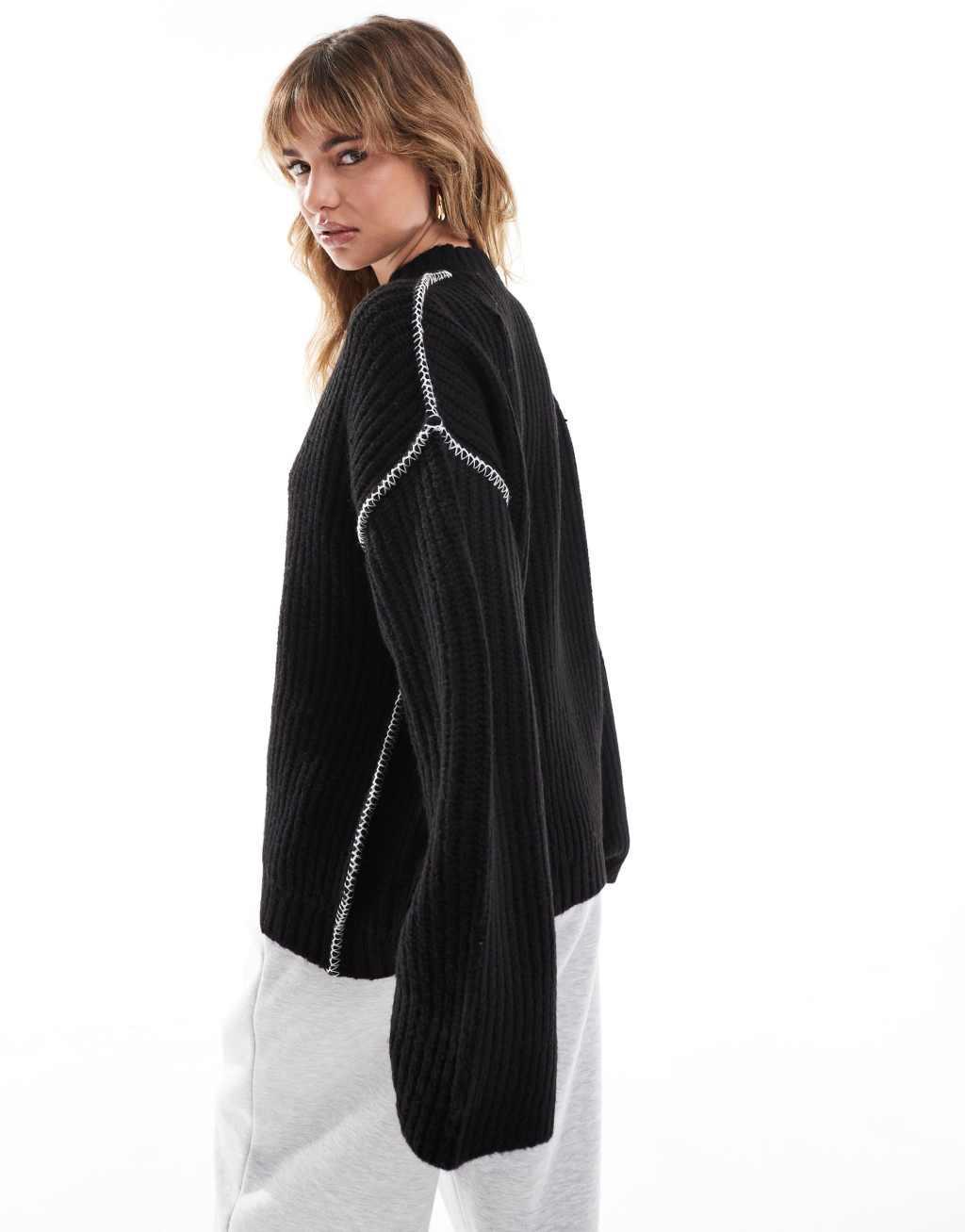 ASOS DESIGN crew neck sweater with contrast blanket stitch in black Product Image