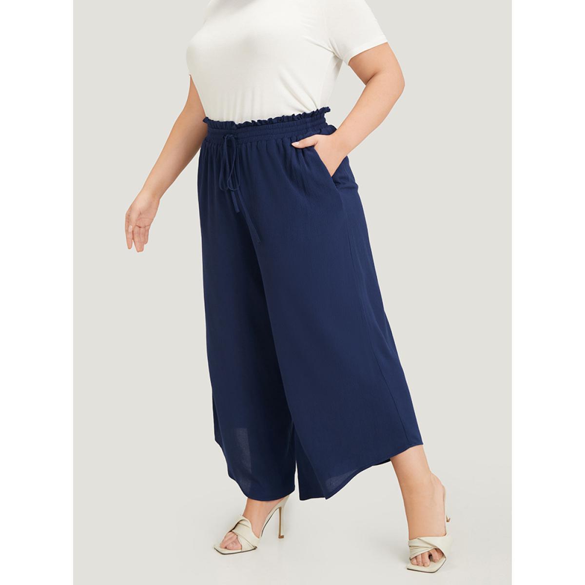 Plus Size Solid Paperbag Waist Asymmetrical Hem Wide Leg Pants Women Indigo Elegant High Rise Dailywear Pants BloomChic 10/M Product Image