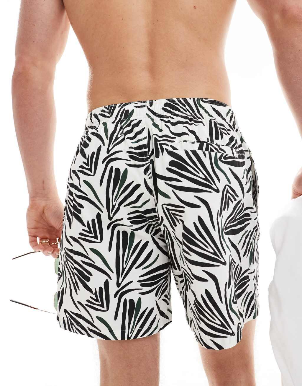Pull&Bear leaf printed swim shorts in black and white Product Image