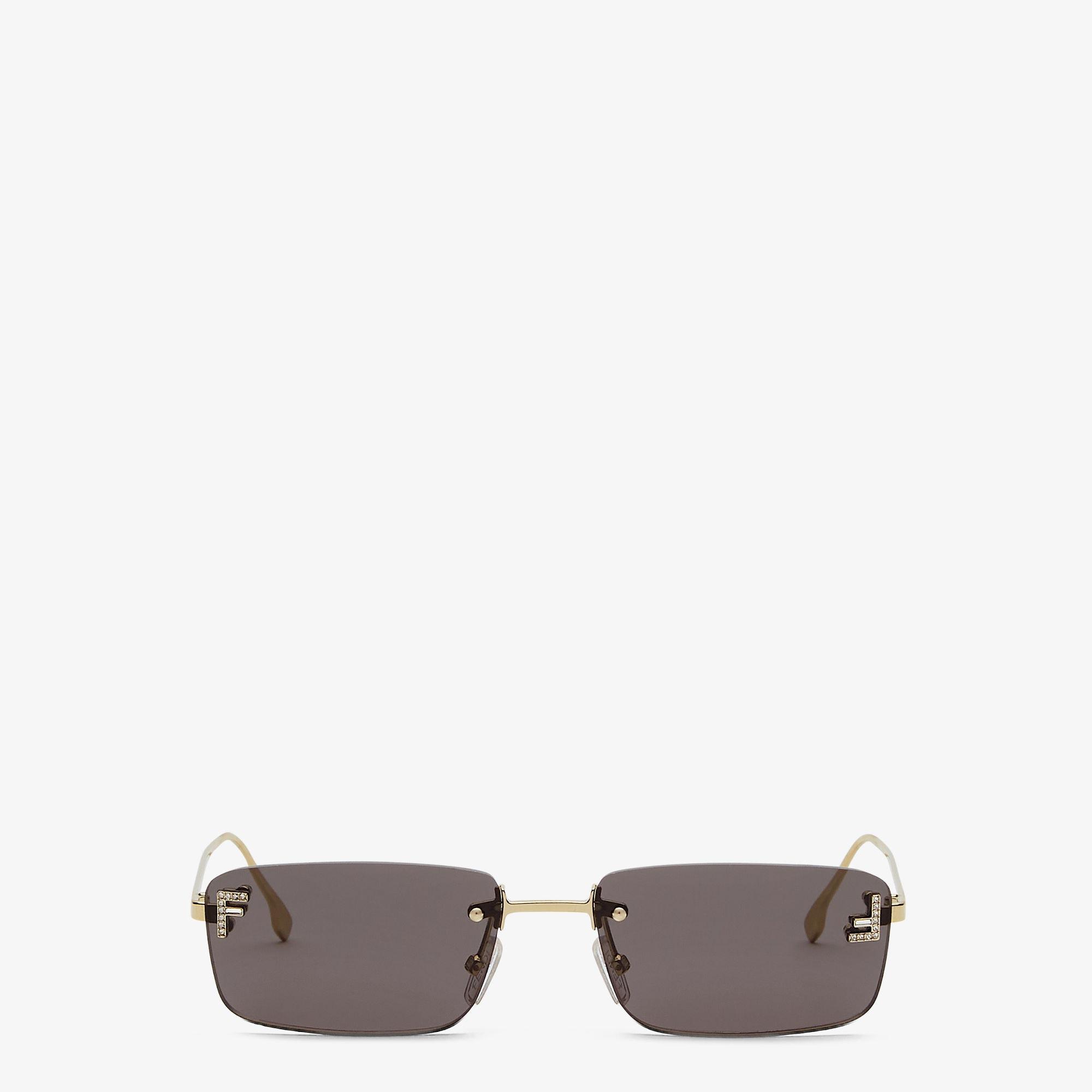 Fendi First CrystalGold-colored sunglasses with gray lenses Product Image