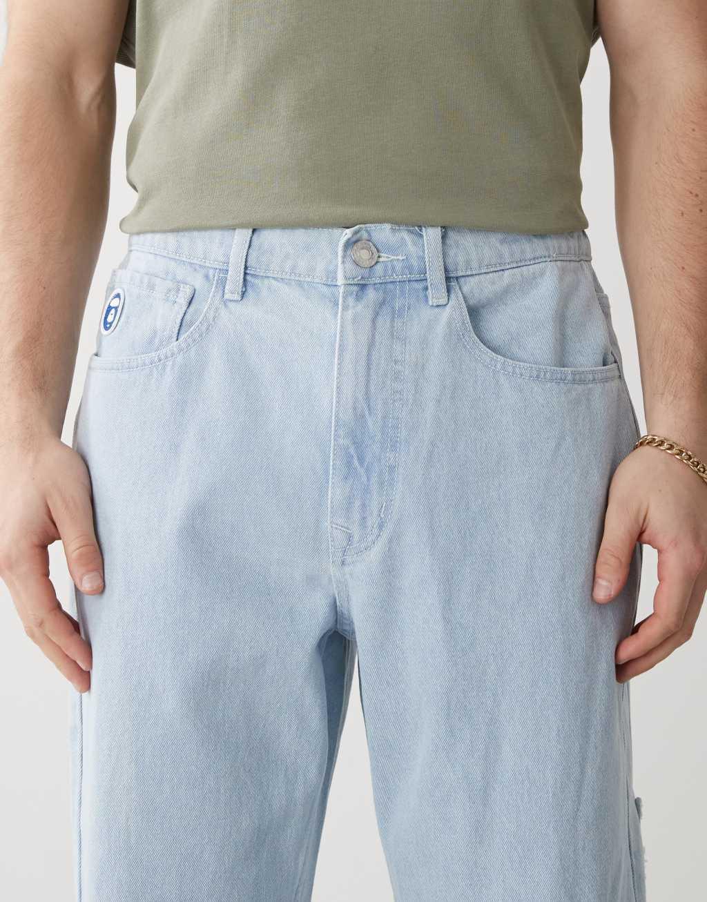 AAPE by A Bathing Ape loose fit logo jeans in light wash Product Image