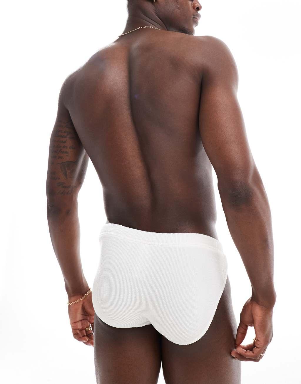 ASOS DESIGN crinkle swim briefs in white Product Image