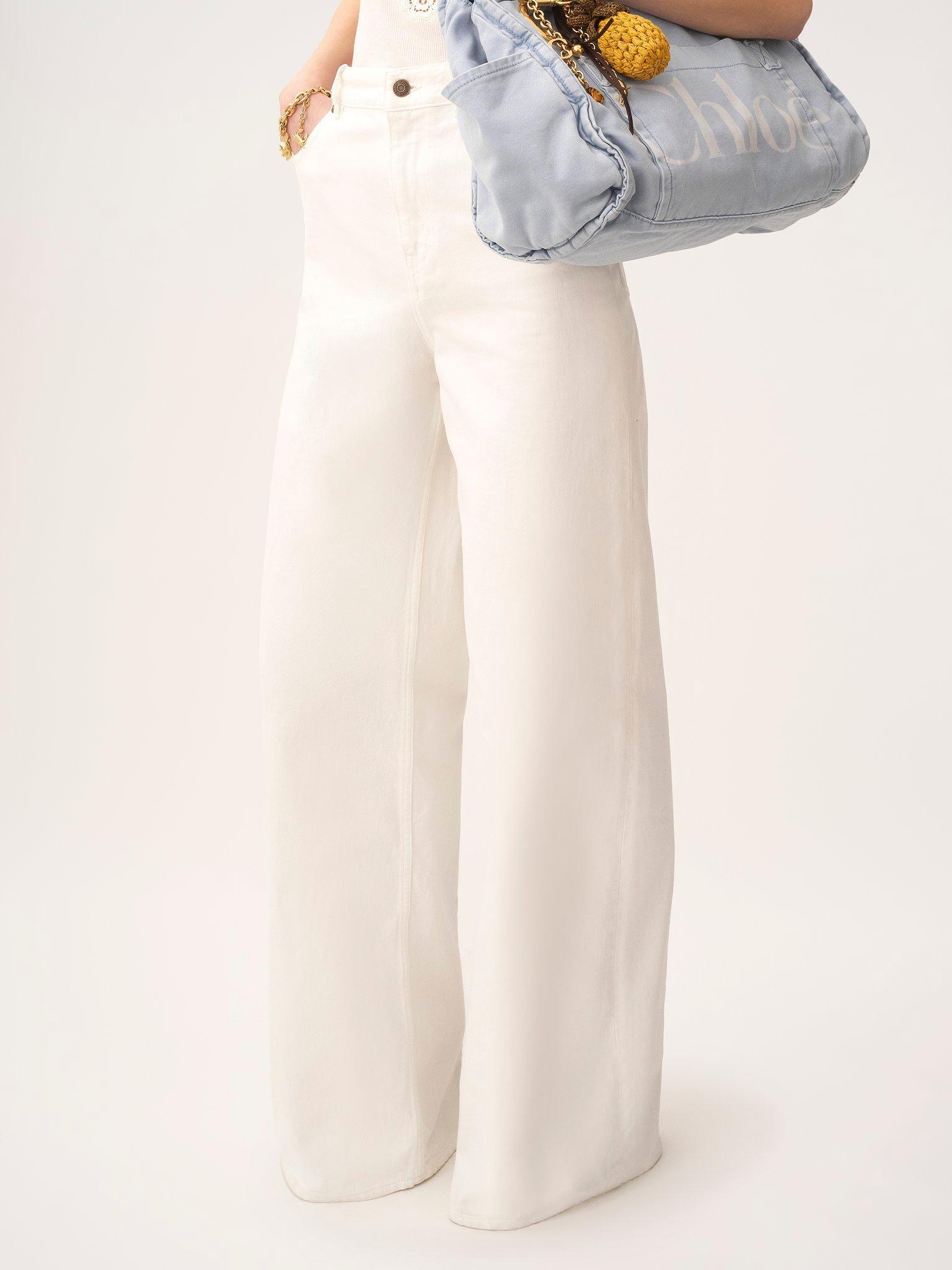 High-rise wide-leg jeans in denim Product Image