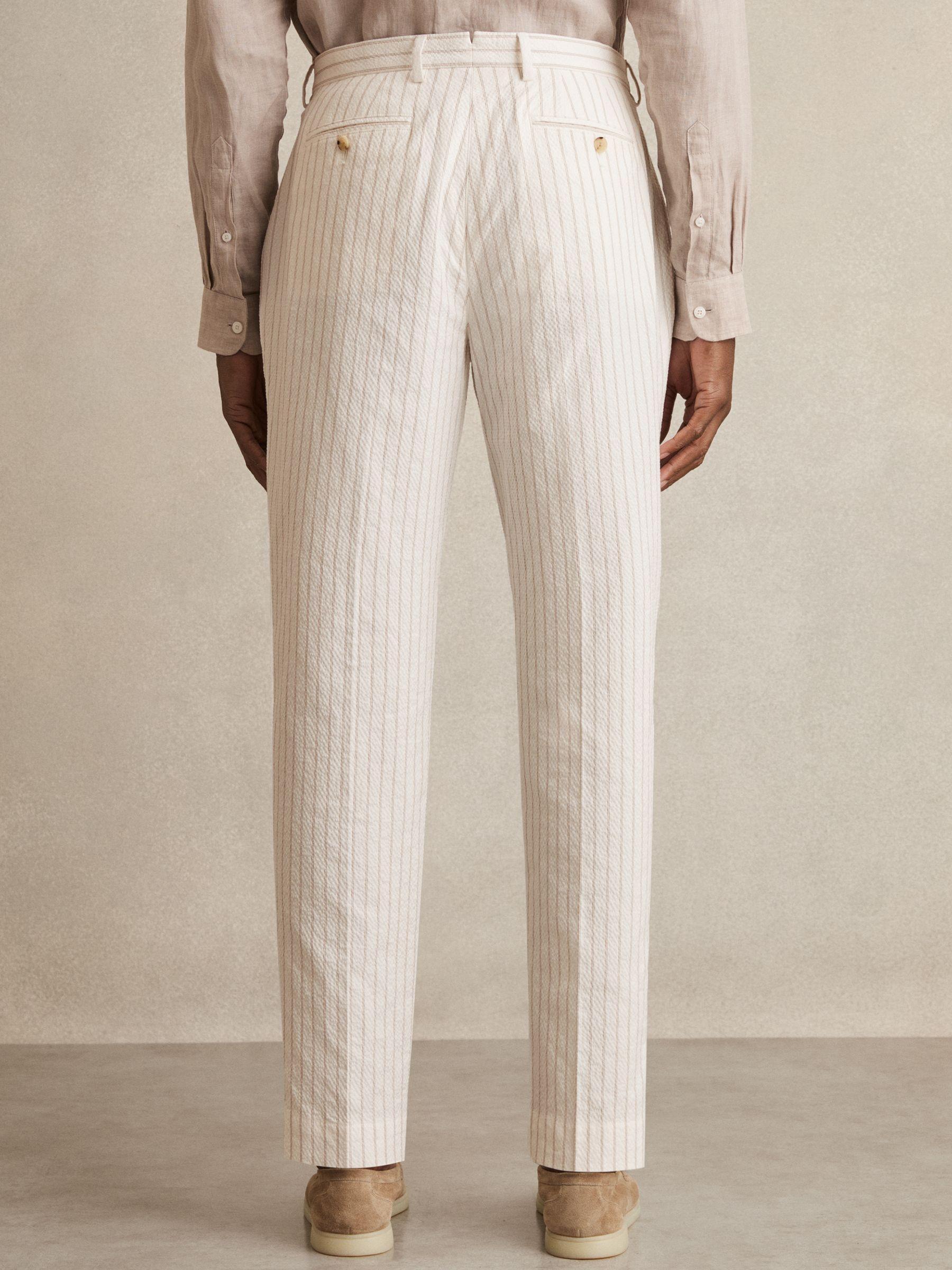 Regular-Fit Cotton-Blend Pinstripe Trousers in Off White/Taupe Brown Product Image