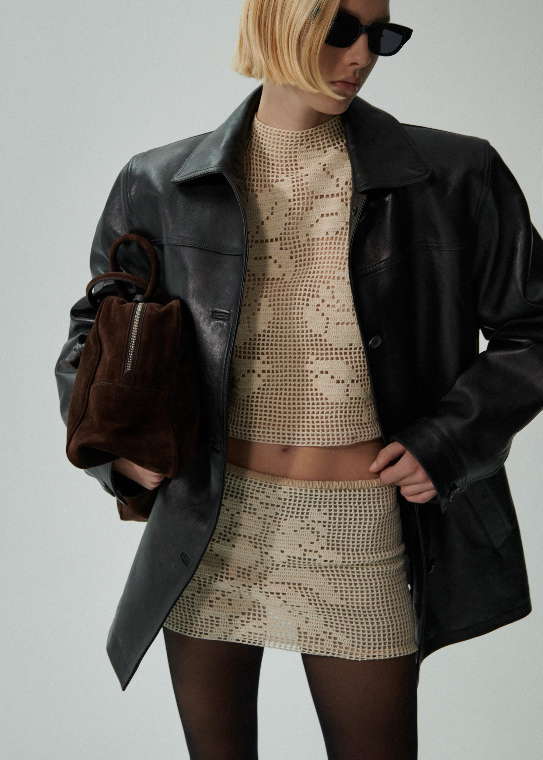 Lace crochet mini skirt in cream Product Image