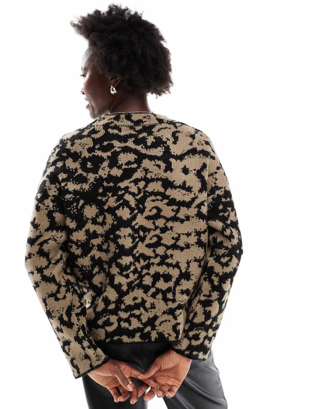 ASOS DESIGN crew neck knitted sweater in abstract leopard print Product Image