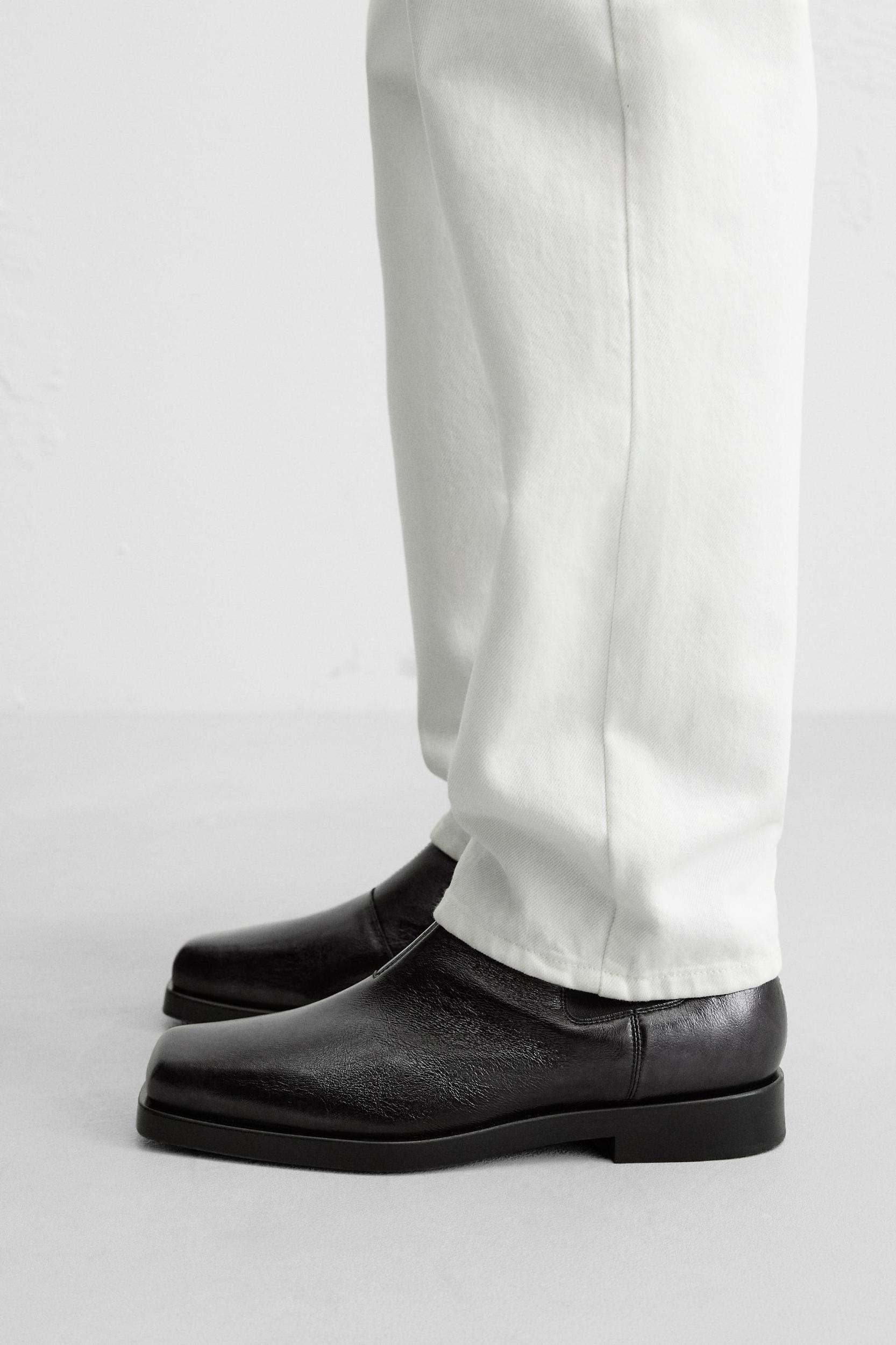 LAMINATED LEATHER CHELSEA BOOTS Product Image